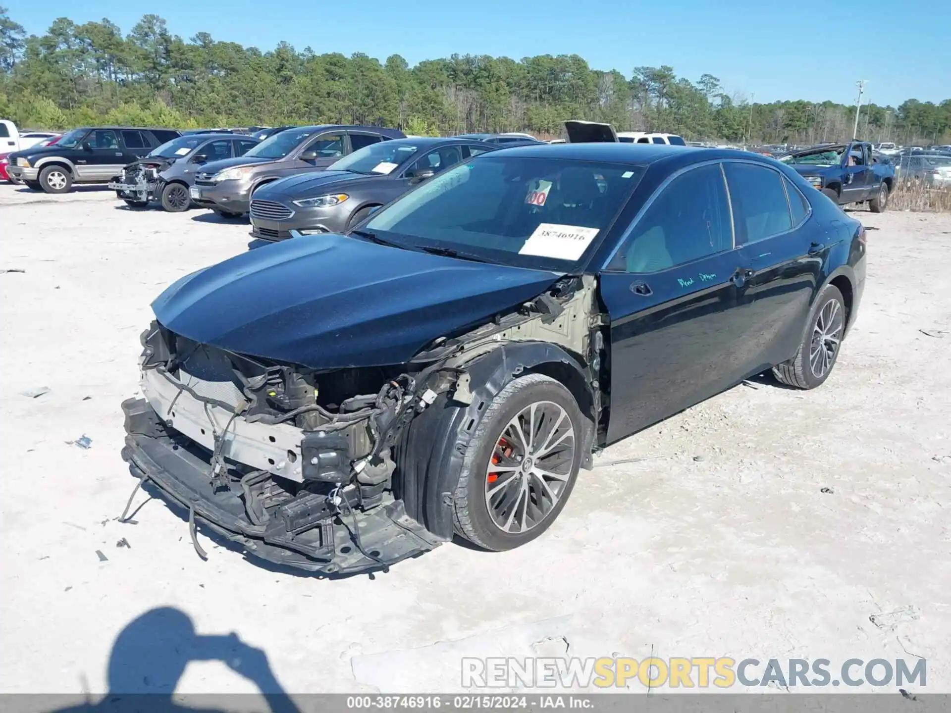 2 Photograph of a damaged car 4T1B11HK0KU718222 TOYOTA CAMRY 2019