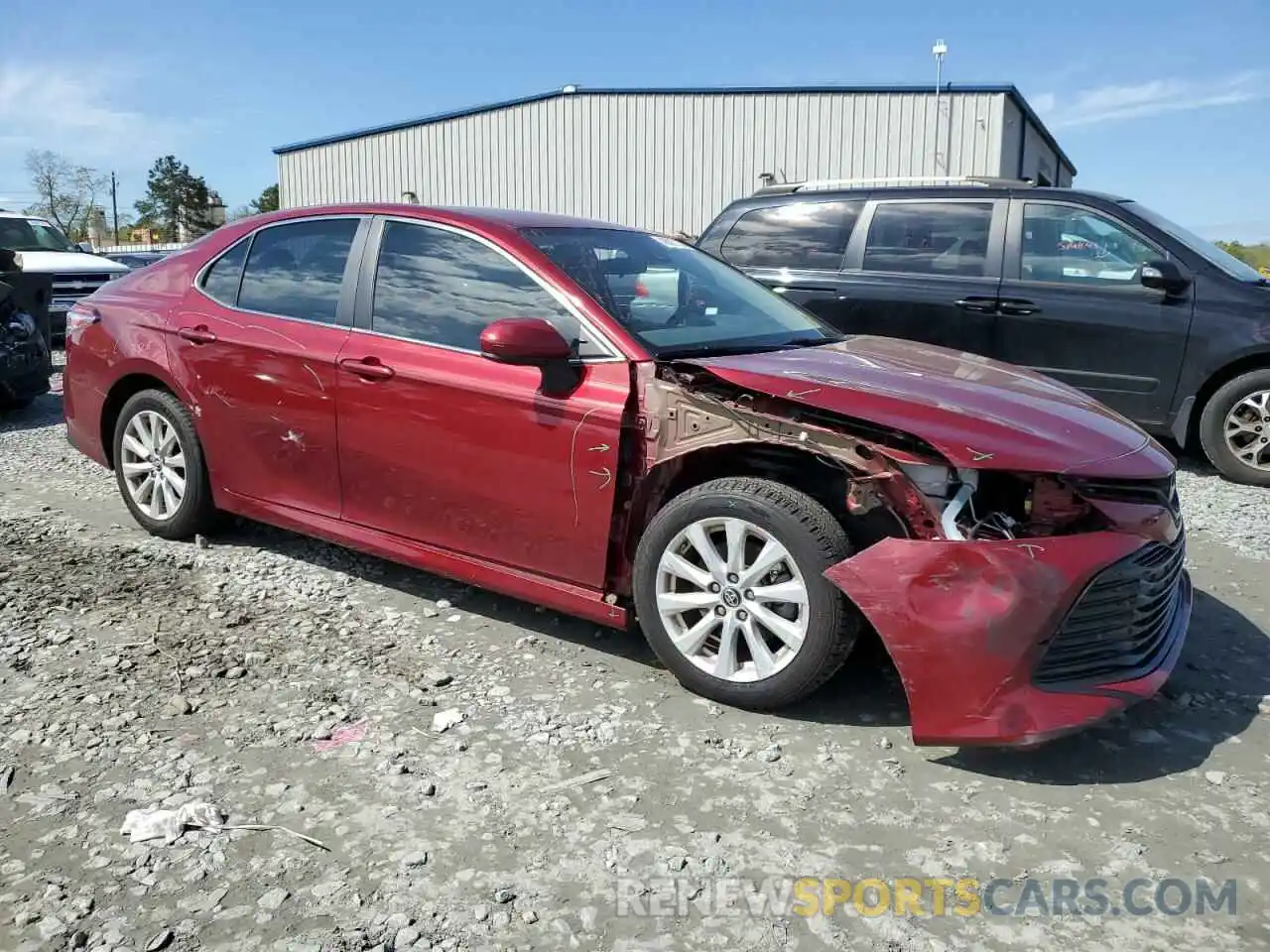 4 Photograph of a damaged car 4T1B11HK0KU718236 TOYOTA CAMRY 2019