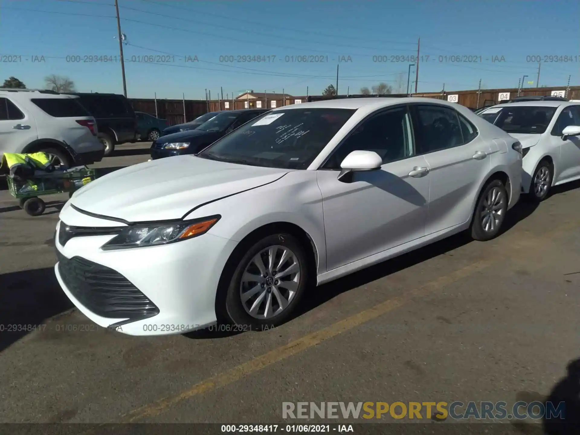 2 Photograph of a damaged car 4T1B11HK0KU718625 TOYOTA CAMRY 2019