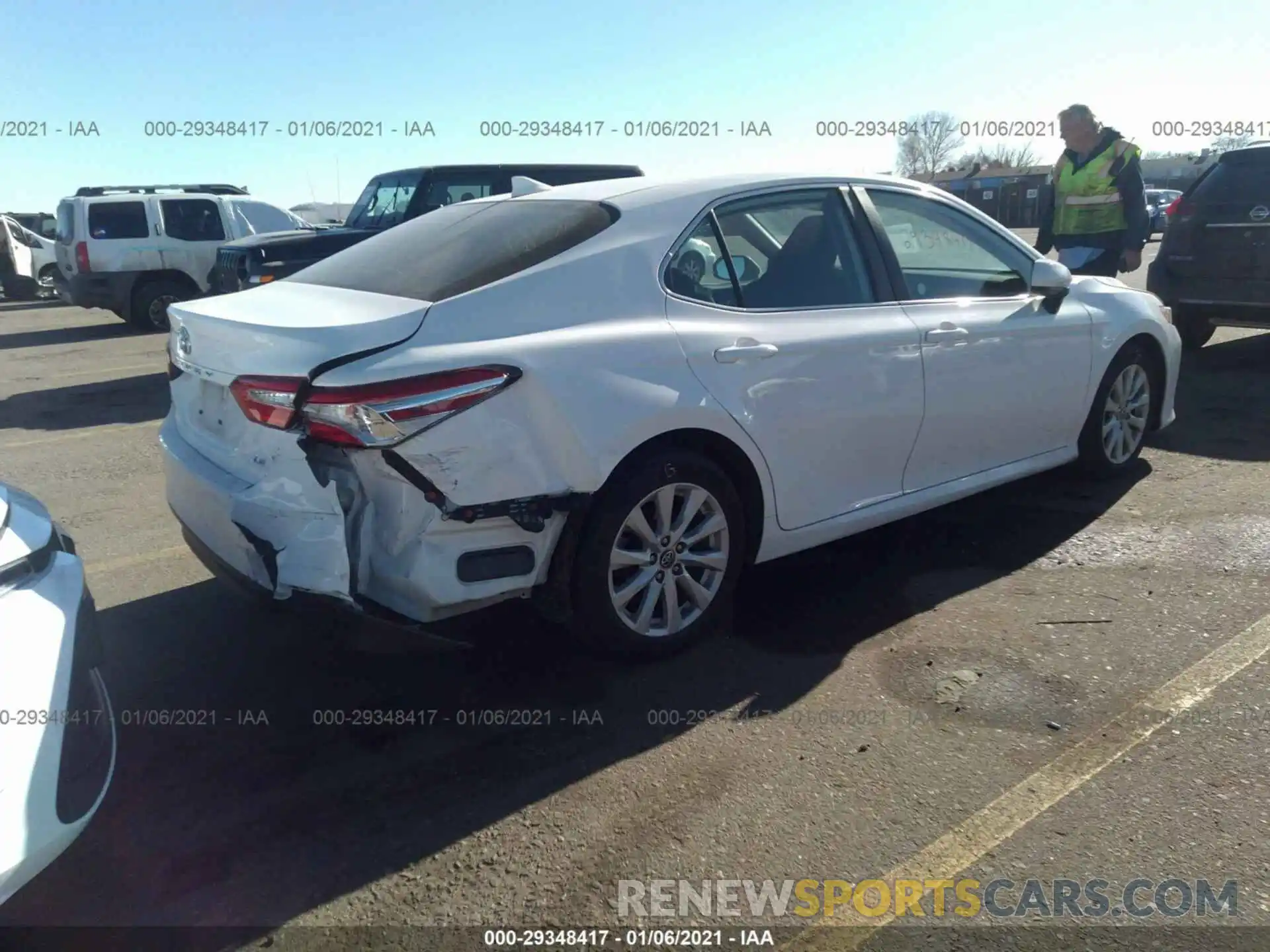 4 Photograph of a damaged car 4T1B11HK0KU718625 TOYOTA CAMRY 2019