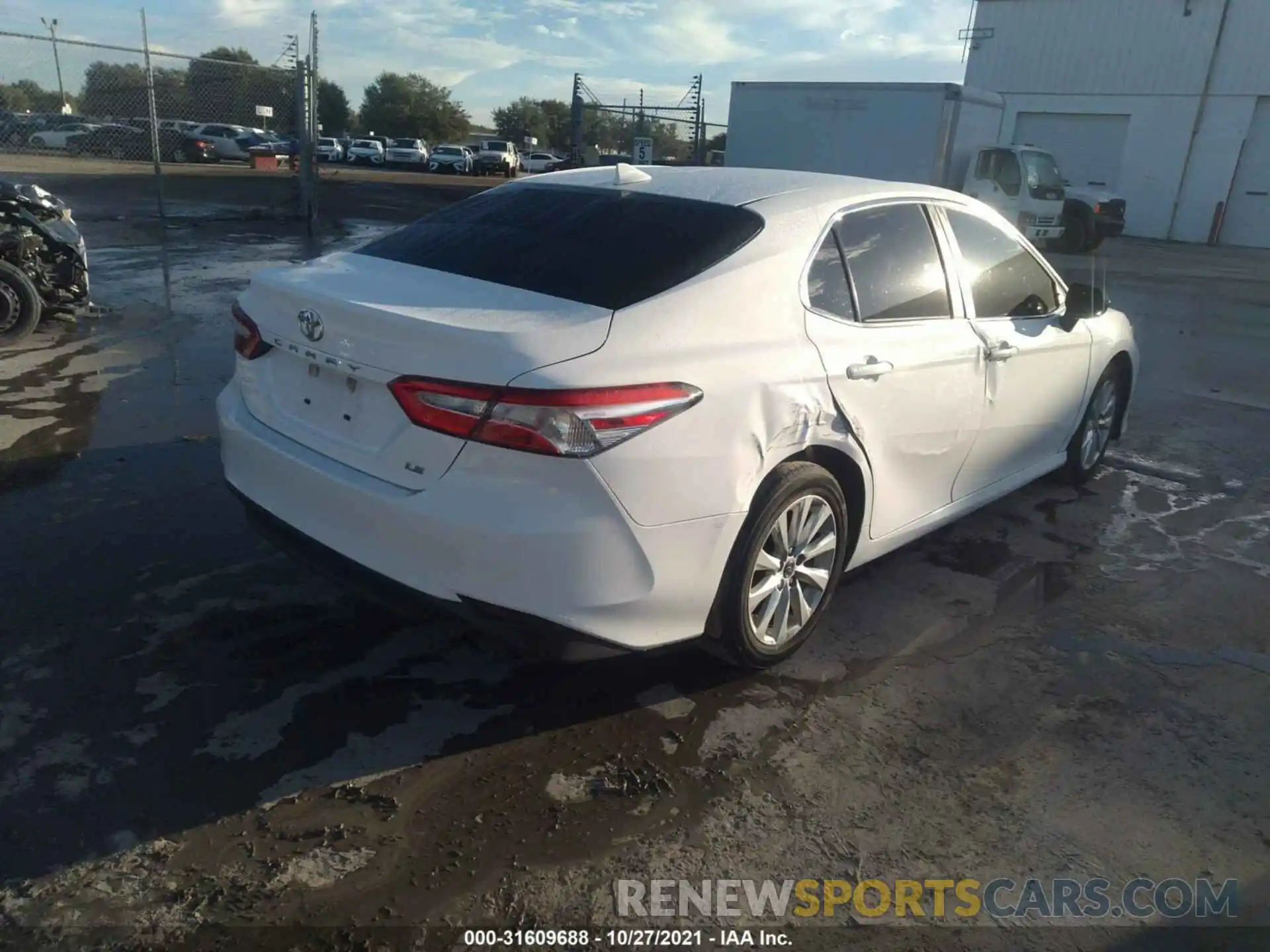 4 Photograph of a damaged car 4T1B11HK0KU718849 TOYOTA CAMRY 2019