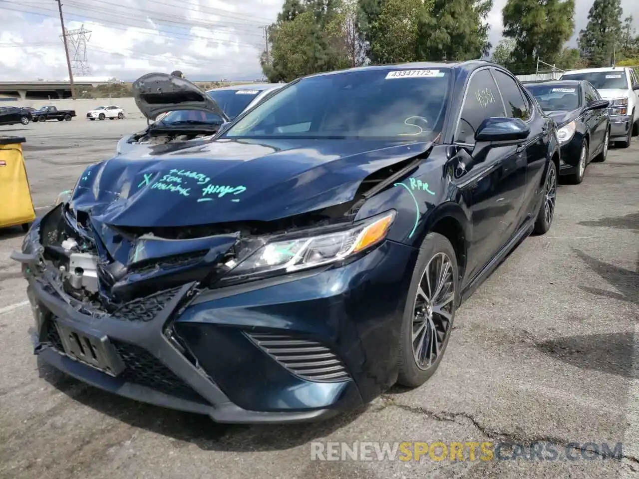 2 Photograph of a damaged car 4T1B11HK0KU719421 TOYOTA CAMRY 2019