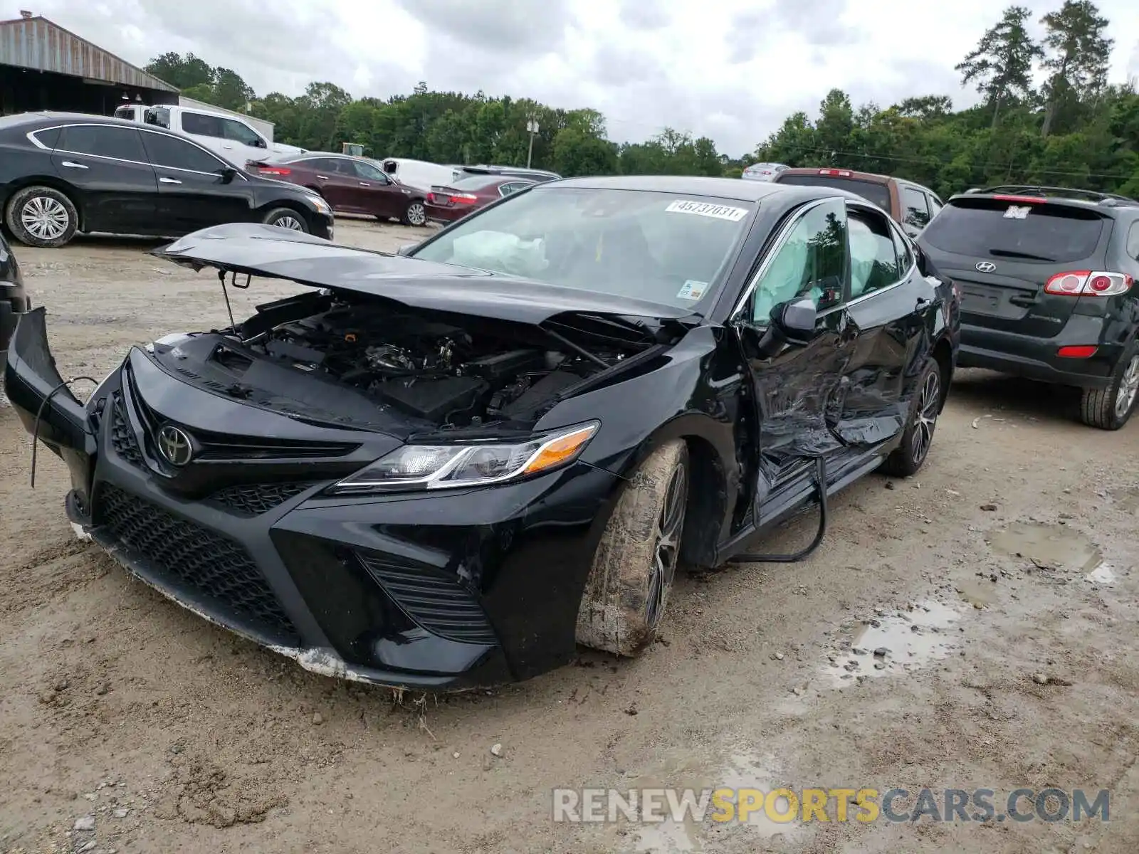 2 Photograph of a damaged car 4T1B11HK0KU722044 TOYOTA CAMRY 2019