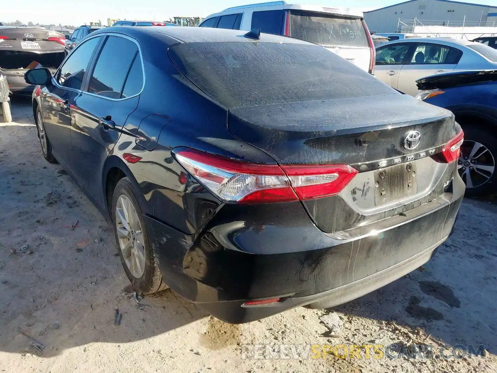 3 Photograph of a damaged car 4T1B11HK0KU722657 TOYOTA CAMRY 2019