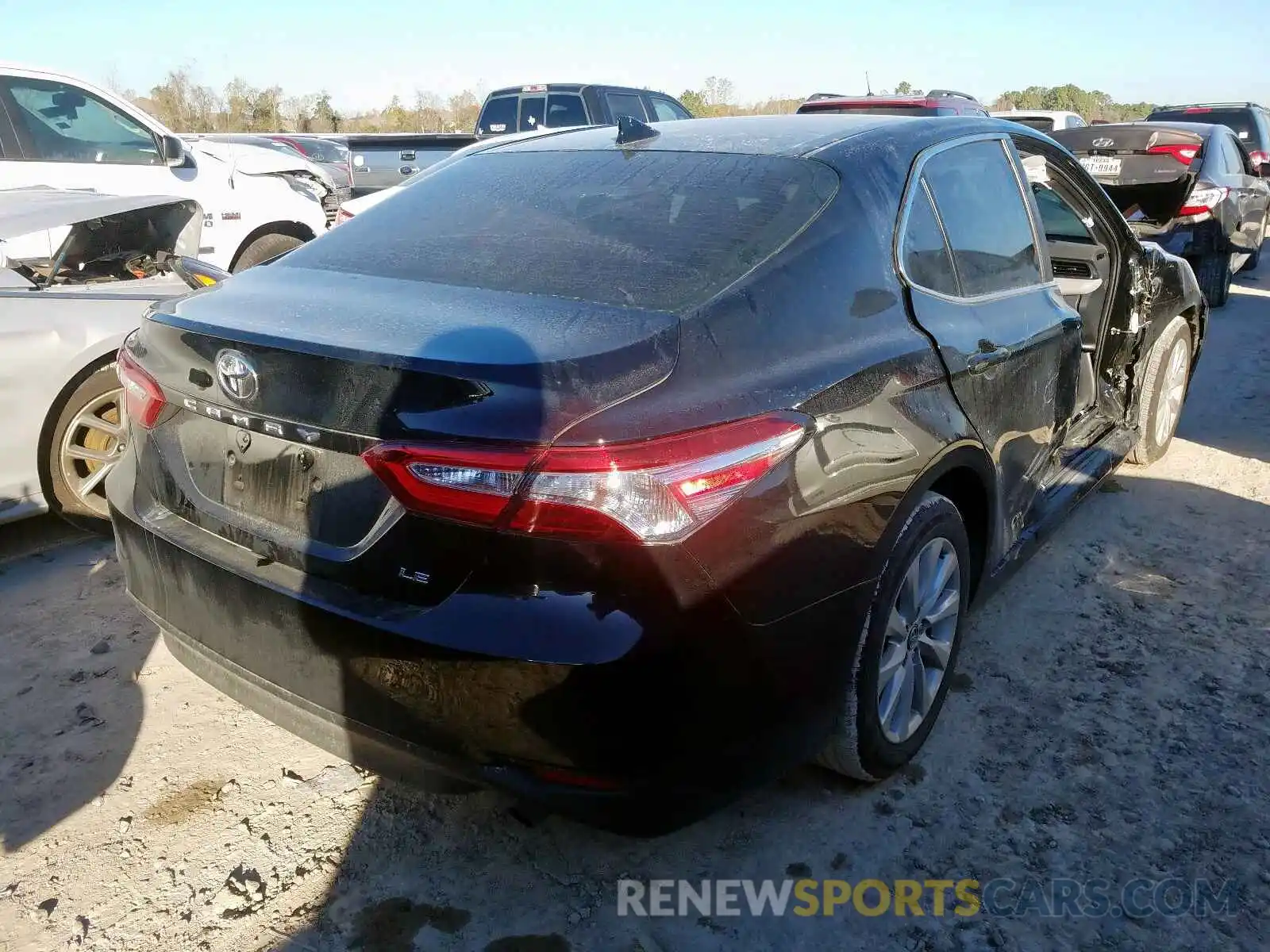 4 Photograph of a damaged car 4T1B11HK0KU722657 TOYOTA CAMRY 2019