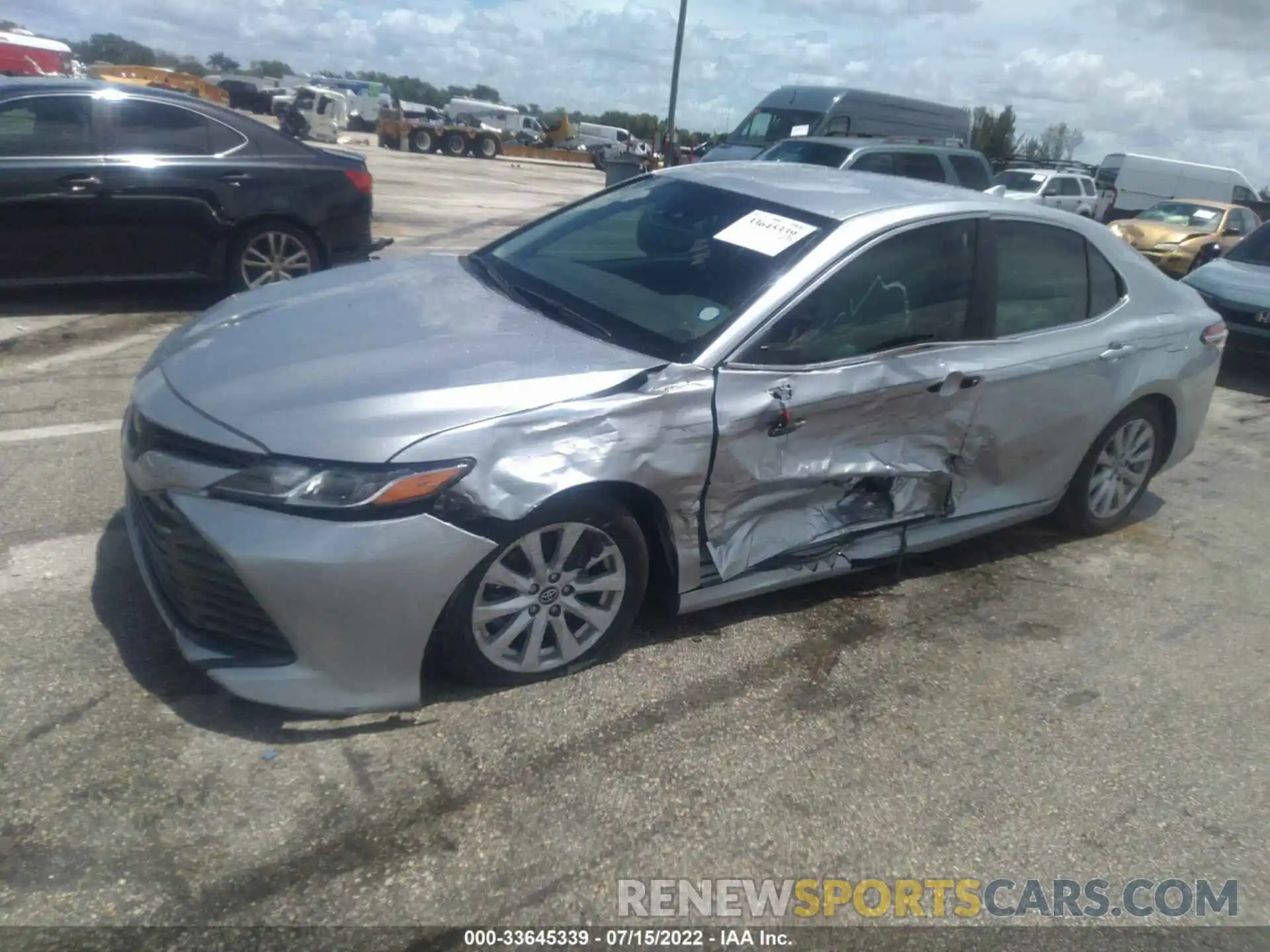 2 Photograph of a damaged car 4T1B11HK0KU723081 TOYOTA CAMRY 2019