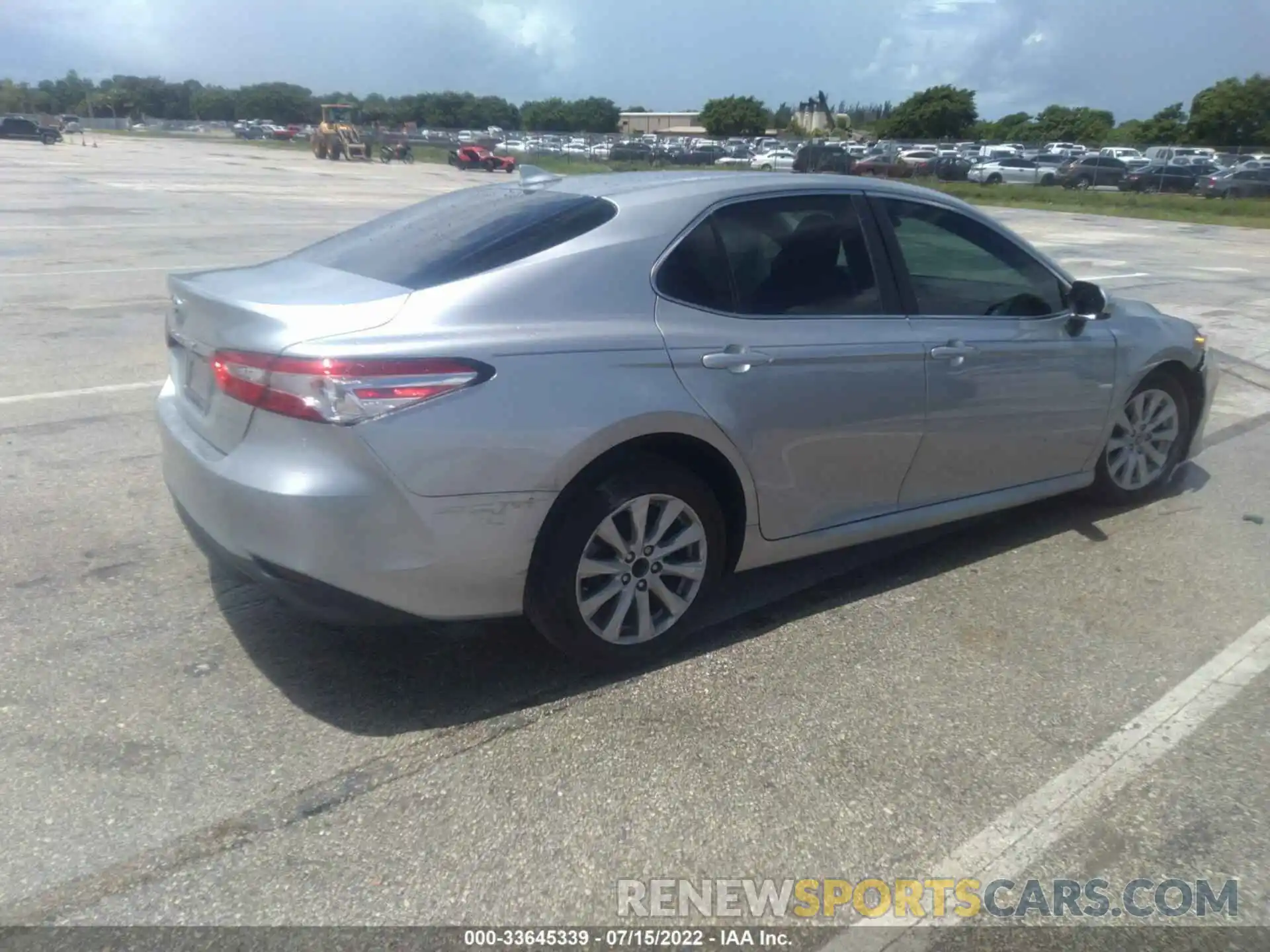 4 Photograph of a damaged car 4T1B11HK0KU723081 TOYOTA CAMRY 2019