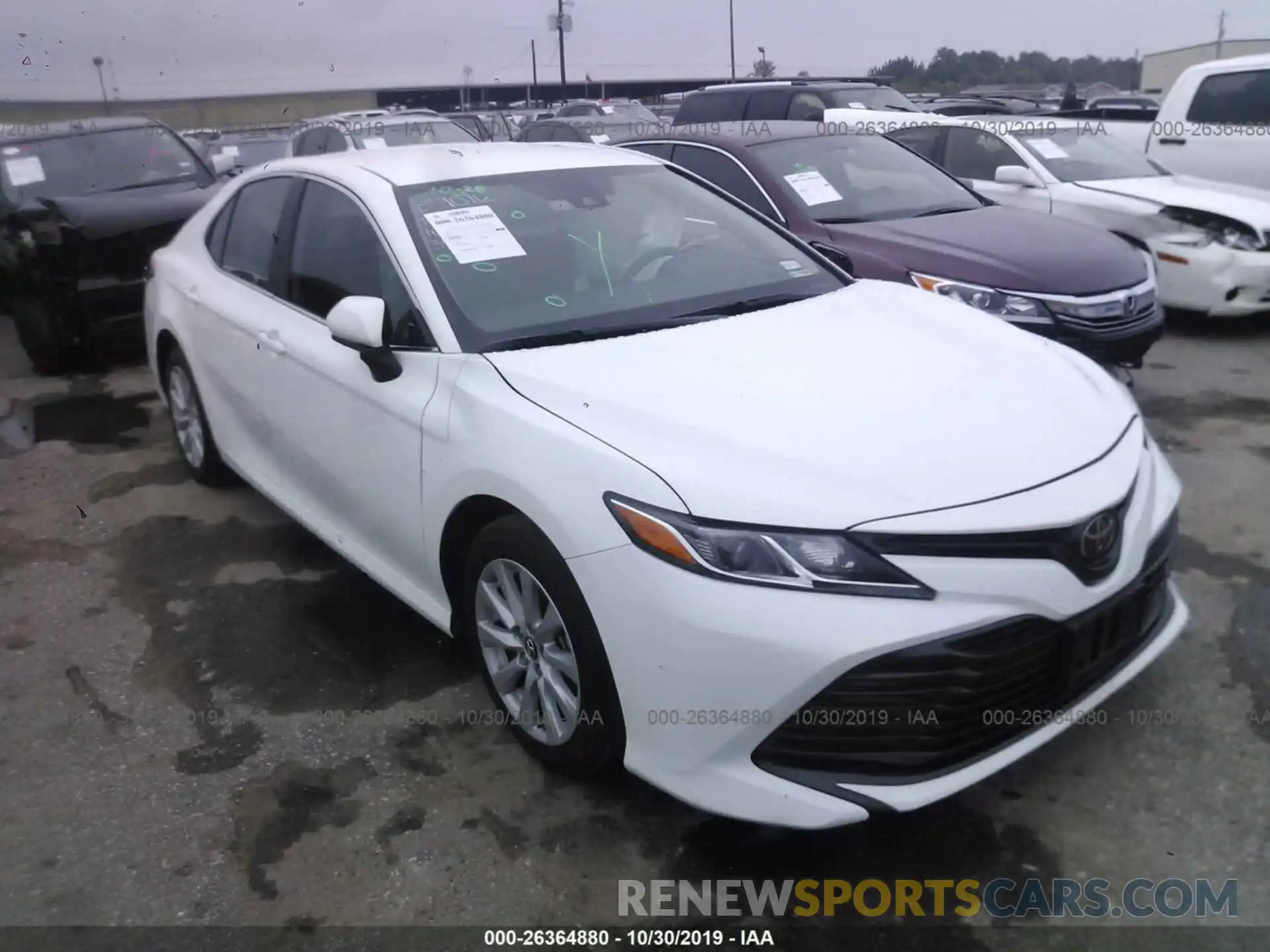 1 Photograph of a damaged car 4T1B11HK0KU723503 TOYOTA CAMRY 2019