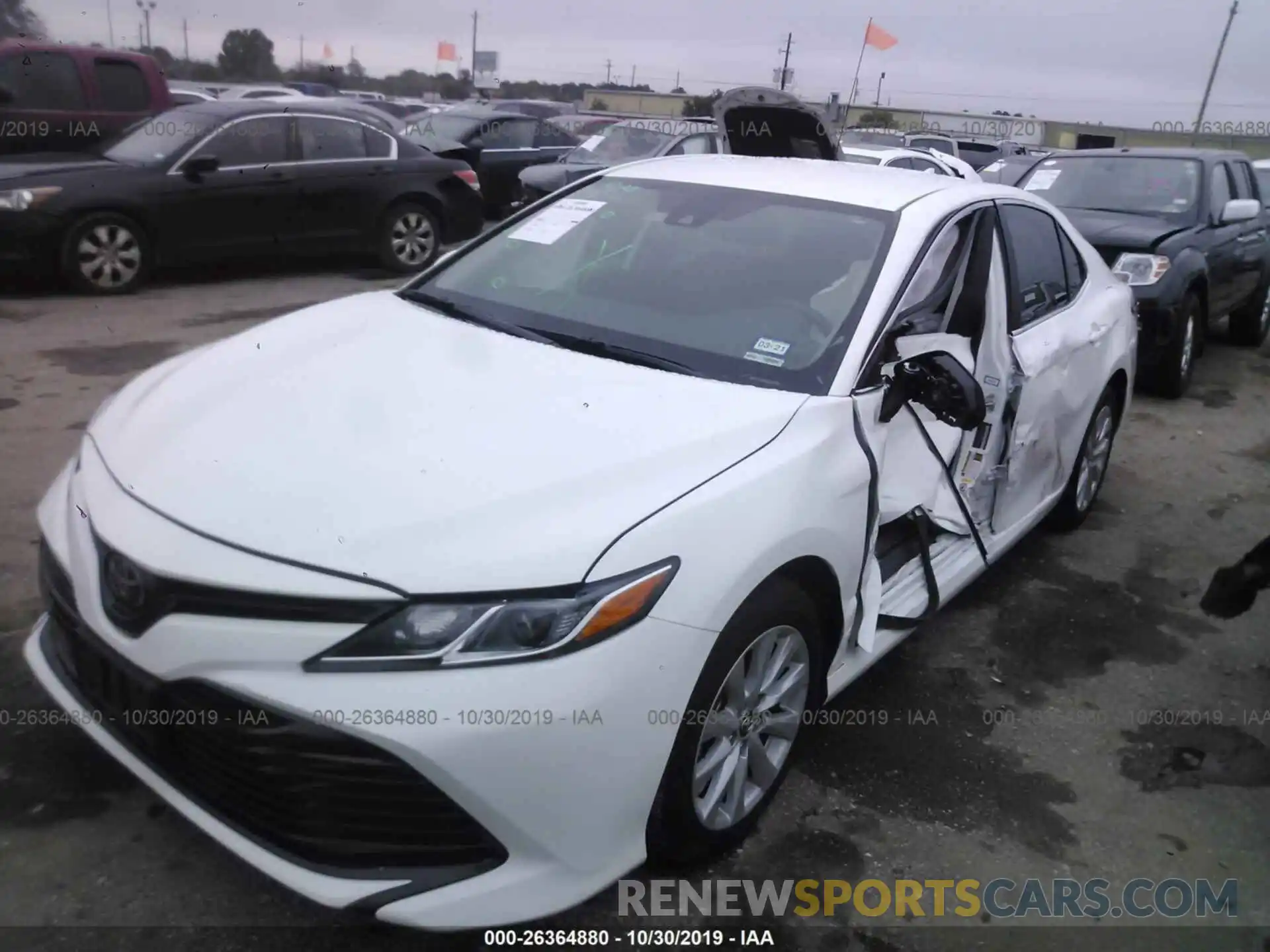 2 Photograph of a damaged car 4T1B11HK0KU723503 TOYOTA CAMRY 2019