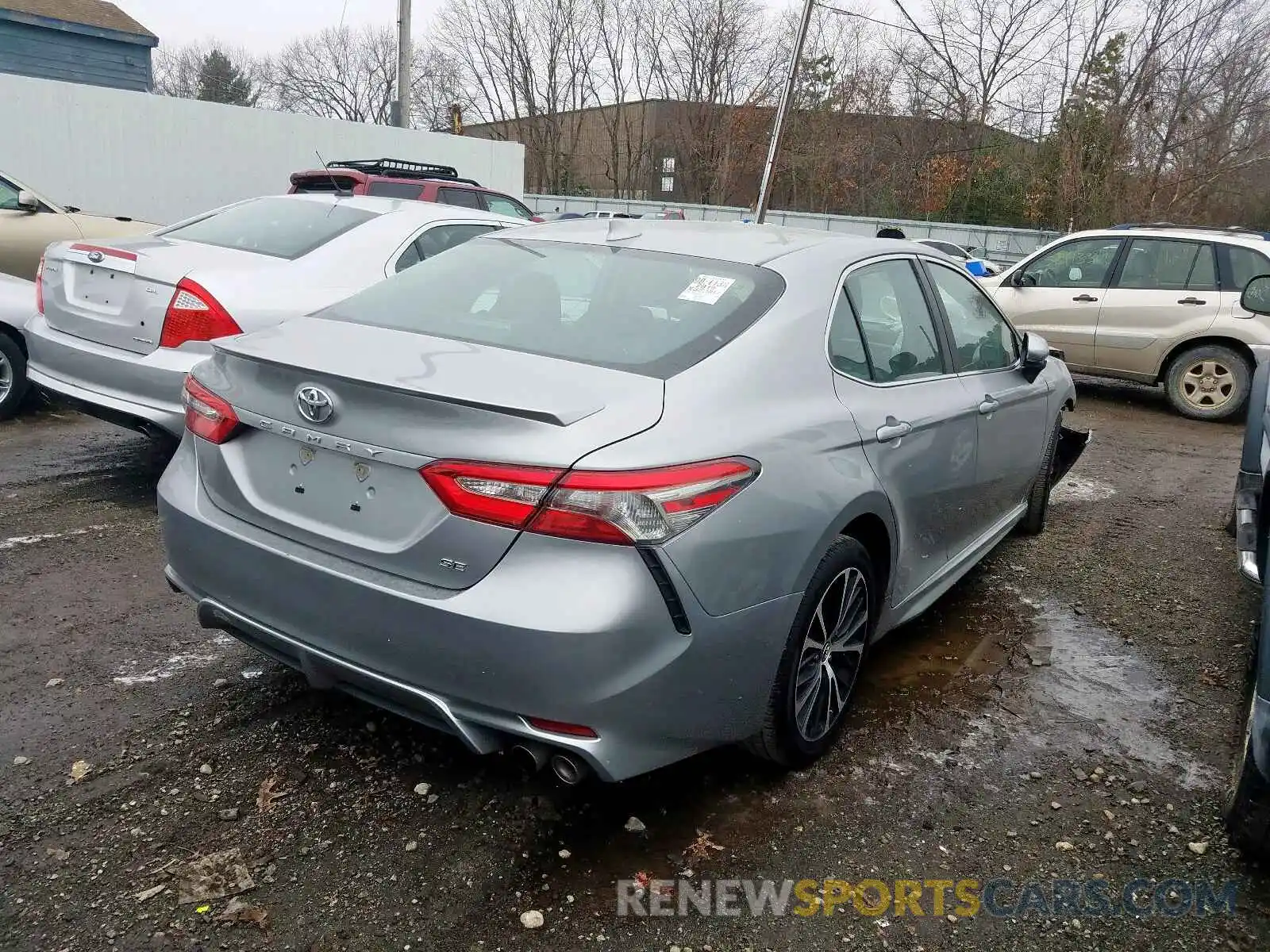 4 Photograph of a damaged car 4T1B11HK0KU723727 TOYOTA CAMRY 2019