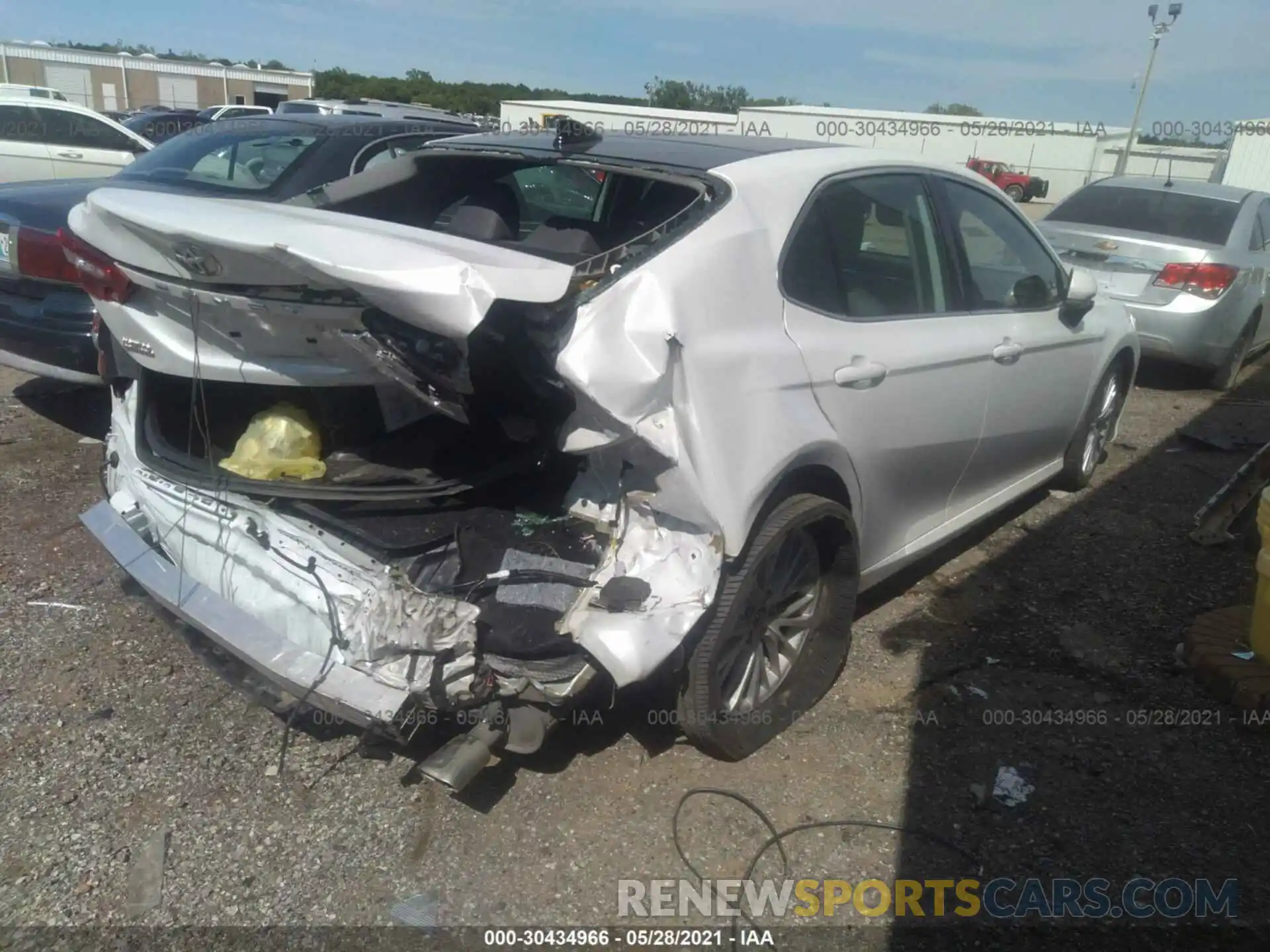 4 Photograph of a damaged car 4T1B11HK0KU724067 TOYOTA CAMRY 2019