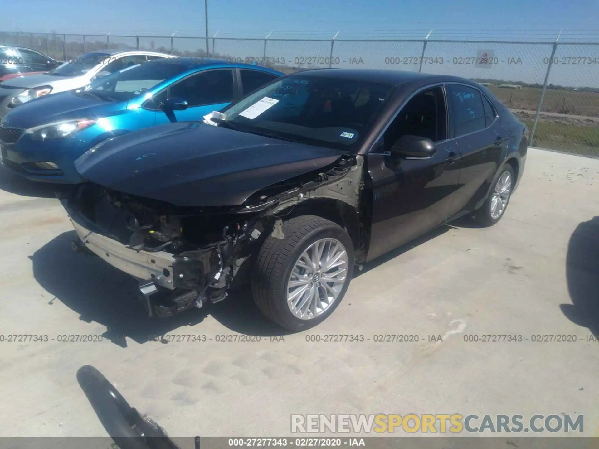 2 Photograph of a damaged car 4T1B11HK0KU726319 TOYOTA CAMRY 2019