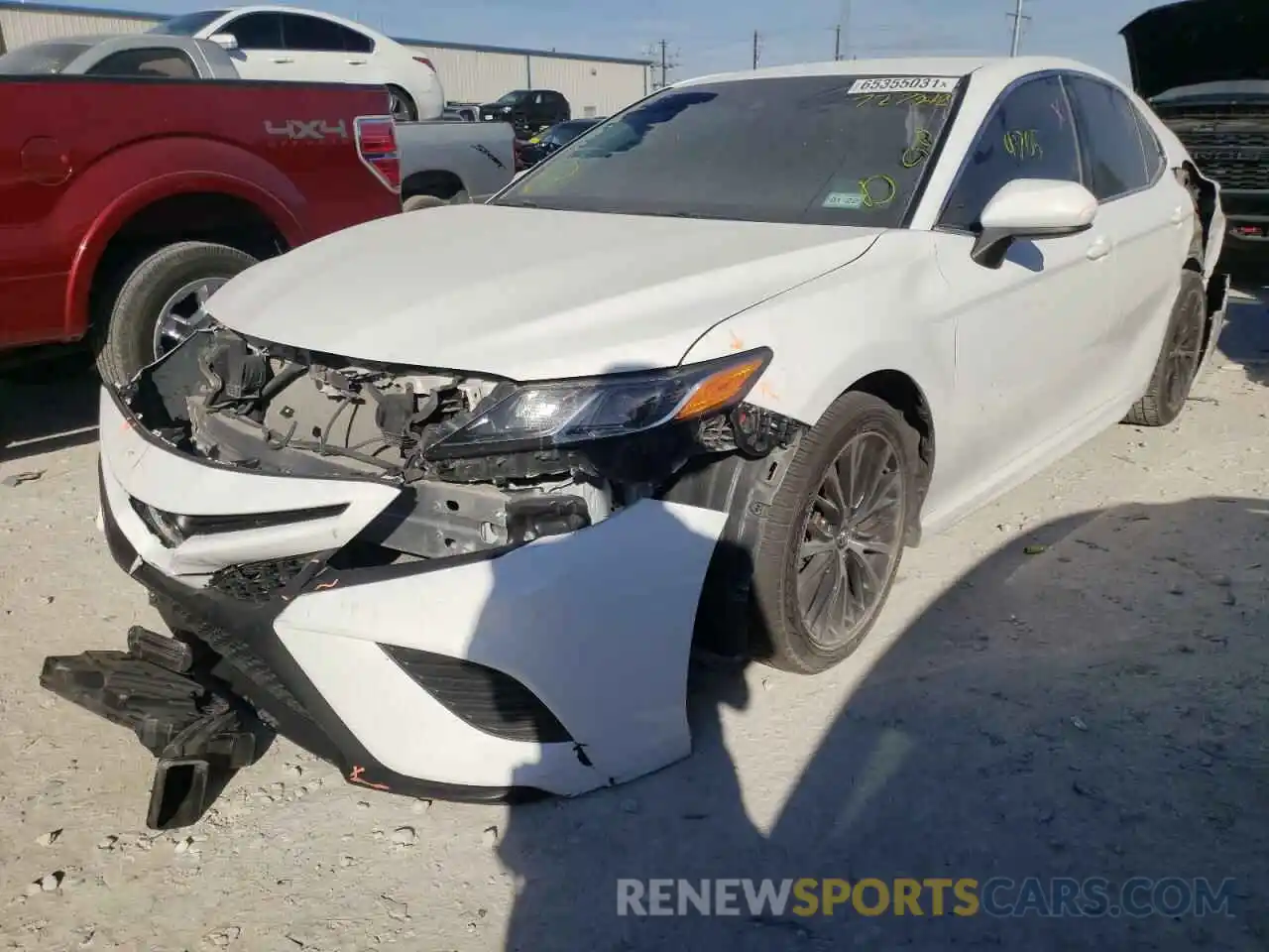 2 Photograph of a damaged car 4T1B11HK0KU727342 TOYOTA CAMRY 2019