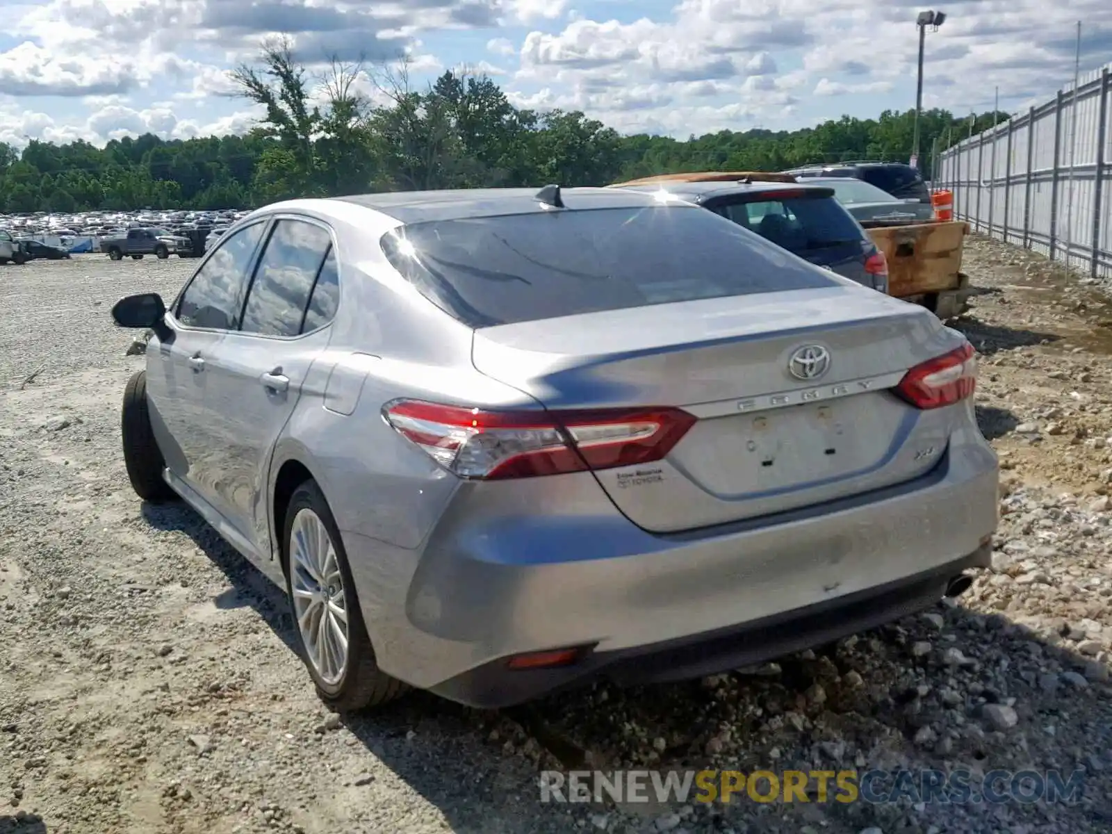 3 Photograph of a damaged car 4T1B11HK0KU729043 TOYOTA CAMRY 2019