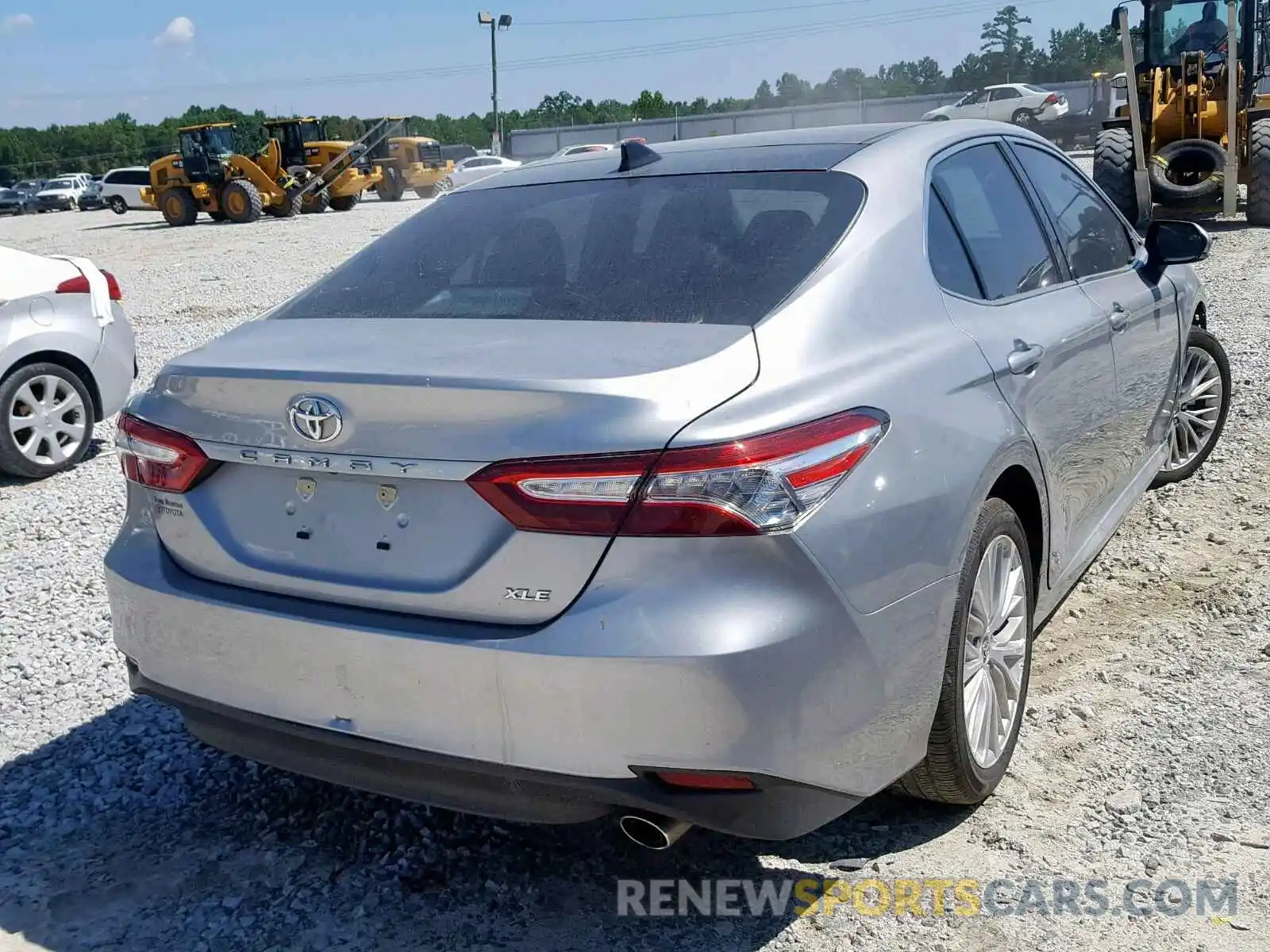 4 Photograph of a damaged car 4T1B11HK0KU729043 TOYOTA CAMRY 2019