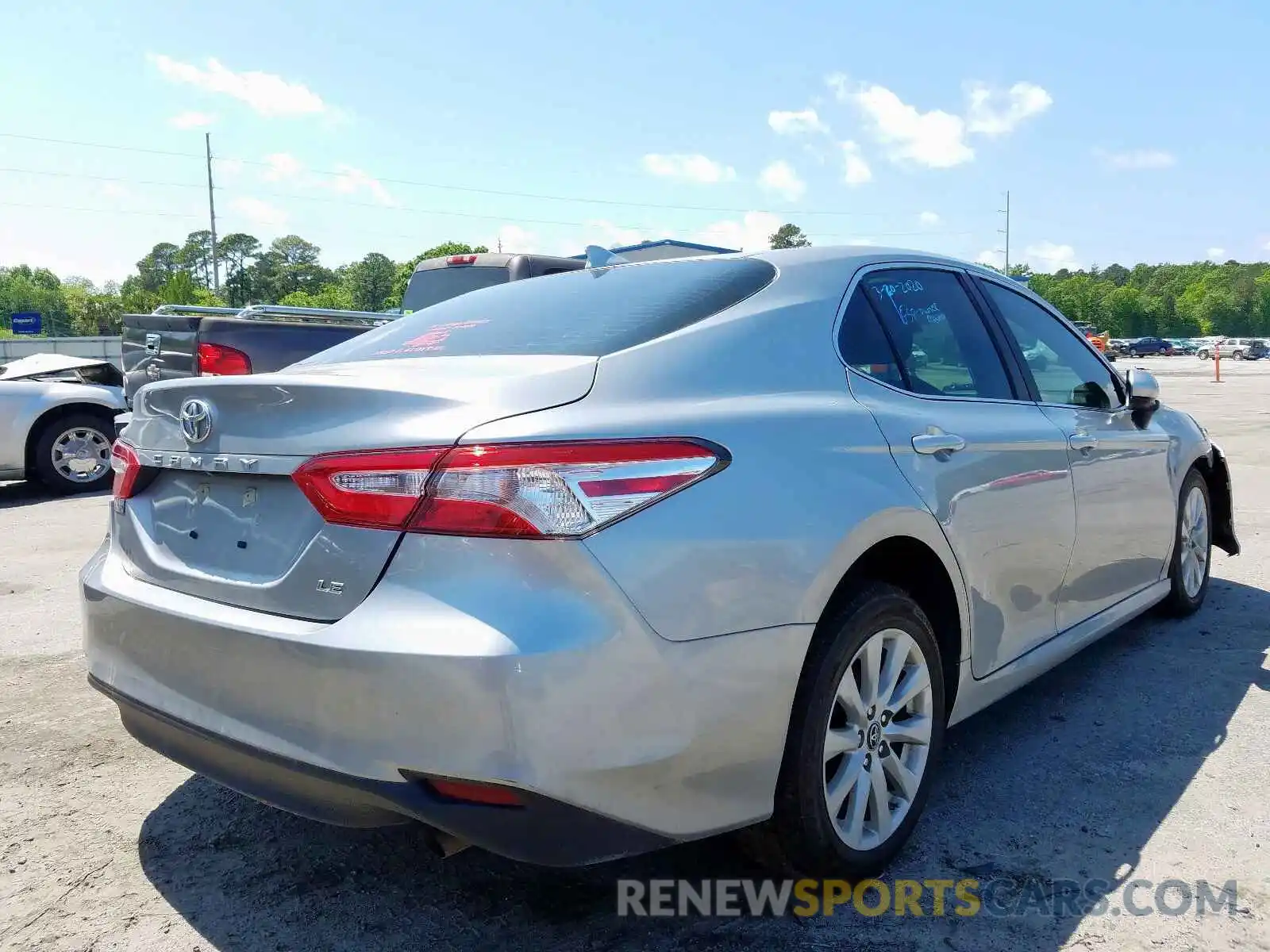 4 Photograph of a damaged car 4T1B11HK0KU729740 TOYOTA CAMRY 2019