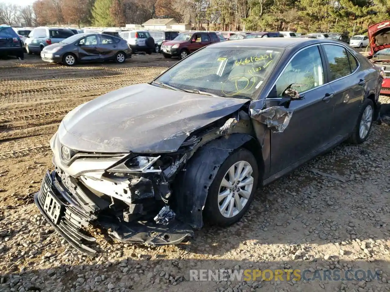 2 Photograph of a damaged car 4T1B11HK0KU729799 TOYOTA CAMRY 2019