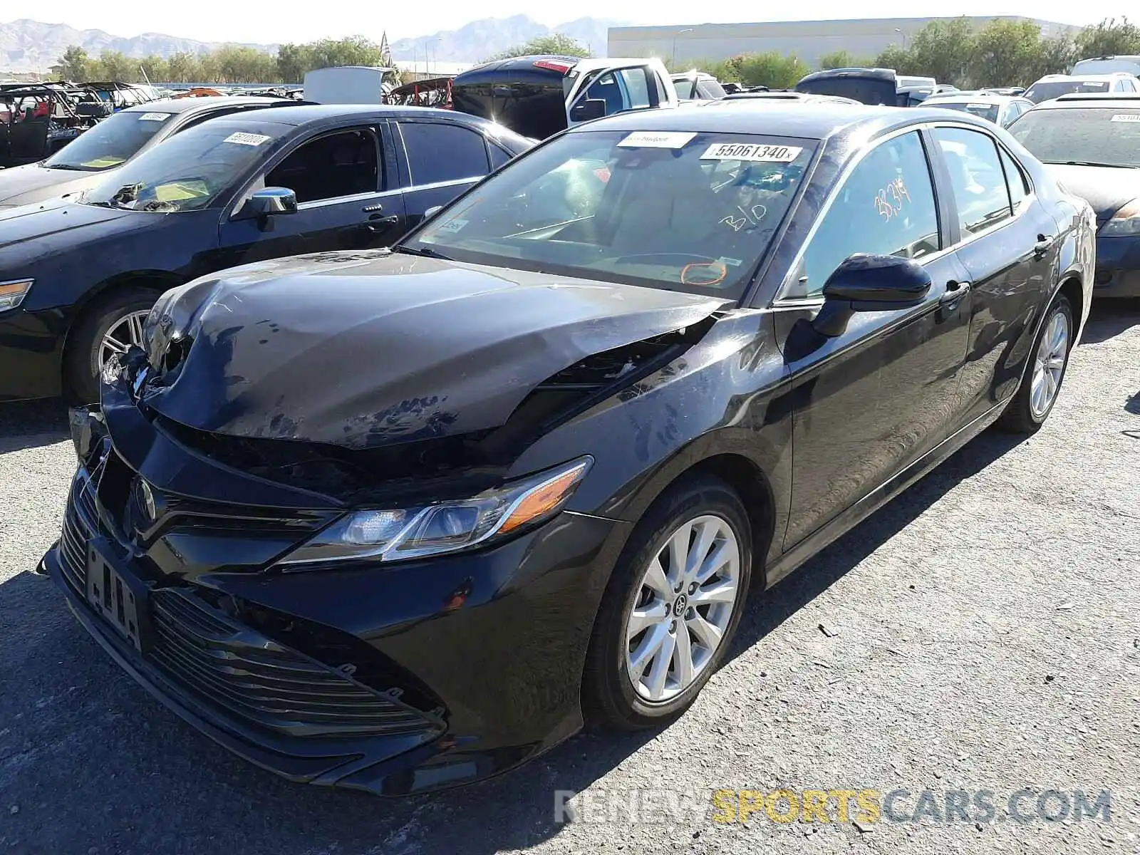 2 Photograph of a damaged car 4T1B11HK0KU730113 TOYOTA CAMRY 2019