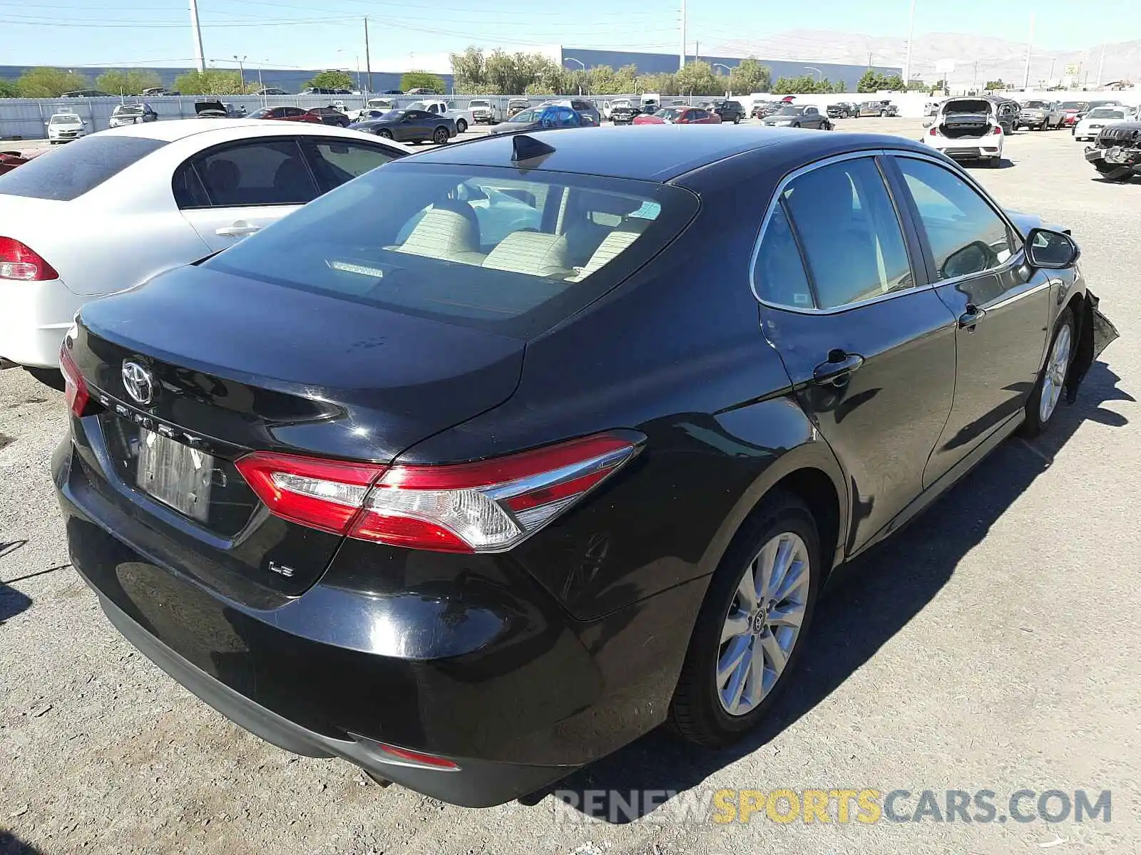 4 Photograph of a damaged car 4T1B11HK0KU730113 TOYOTA CAMRY 2019