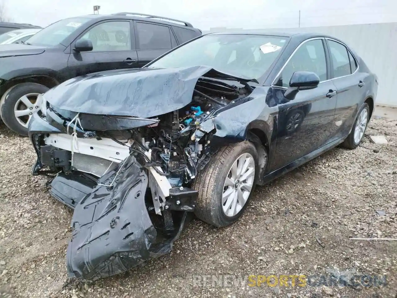 2 Photograph of a damaged car 4T1B11HK0KU731357 TOYOTA CAMRY 2019