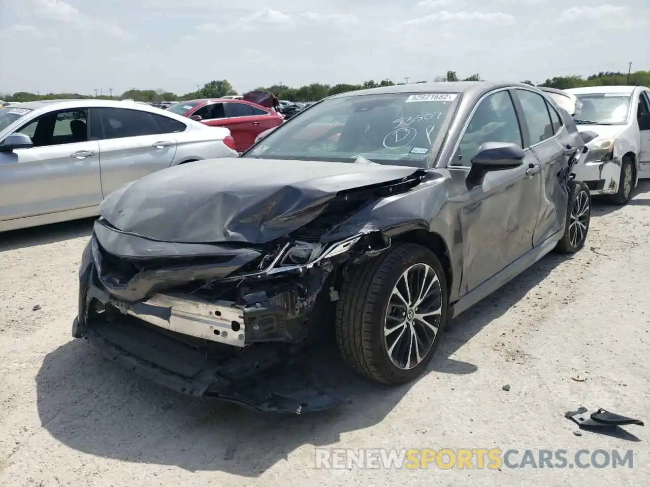 2 Photograph of a damaged car 4T1B11HK0KU736025 TOYOTA CAMRY 2019