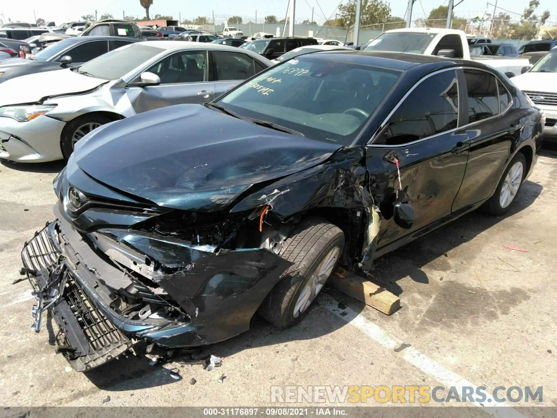 2 Photograph of a damaged car 4T1B11HK0KU738048 TOYOTA CAMRY 2019