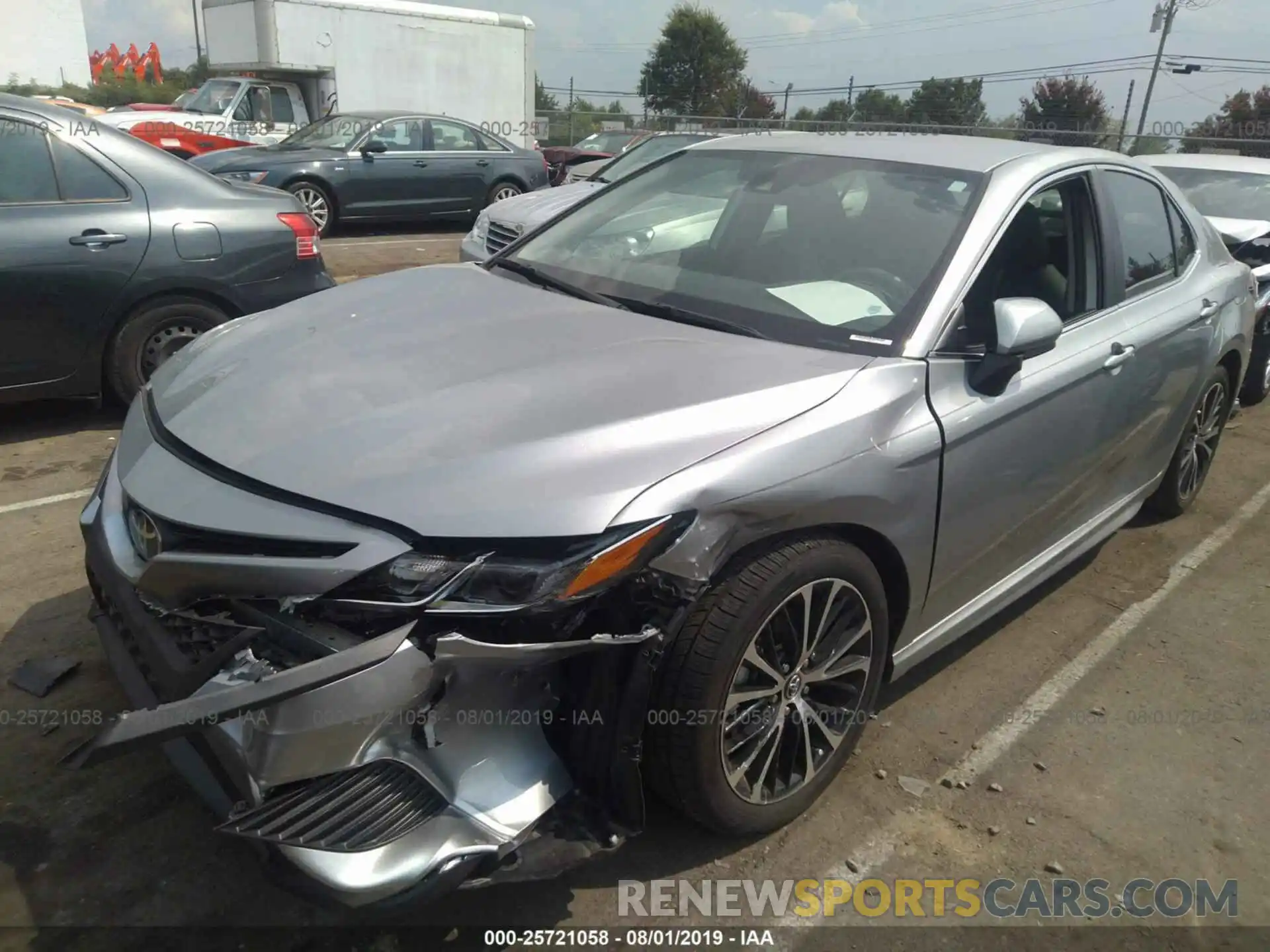 2 Photograph of a damaged car 4T1B11HK0KU738115 TOYOTA CAMRY 2019