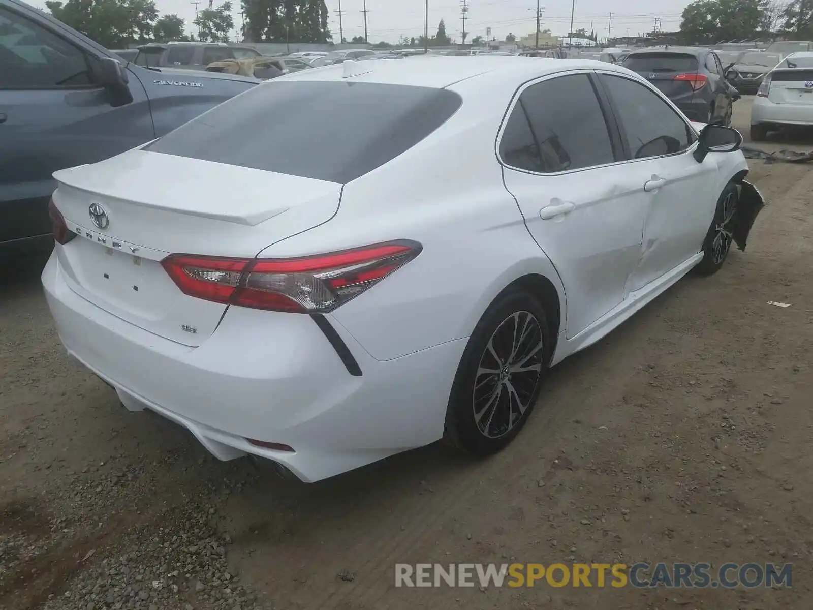 4 Photograph of a damaged car 4T1B11HK0KU741029 TOYOTA CAMRY 2019