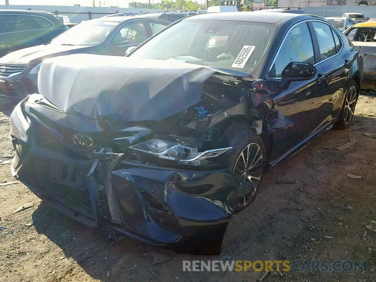 2 Photograph of a damaged car 4T1B11HK0KU741984 TOYOTA CAMRY 2019