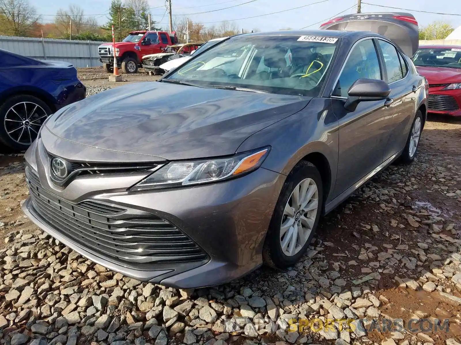 2 Photograph of a damaged car 4T1B11HK0KU742343 TOYOTA CAMRY 2019