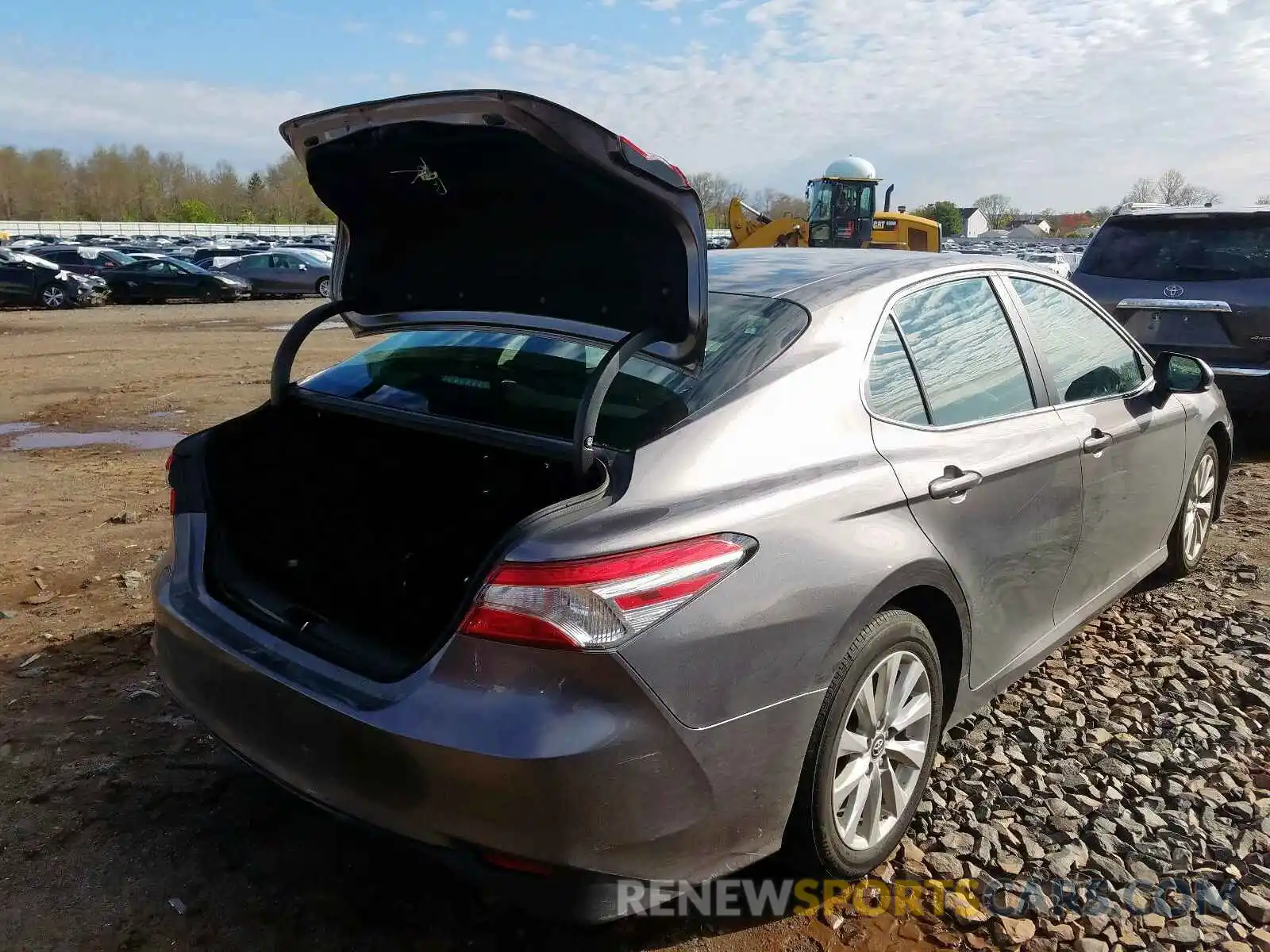 4 Photograph of a damaged car 4T1B11HK0KU742343 TOYOTA CAMRY 2019