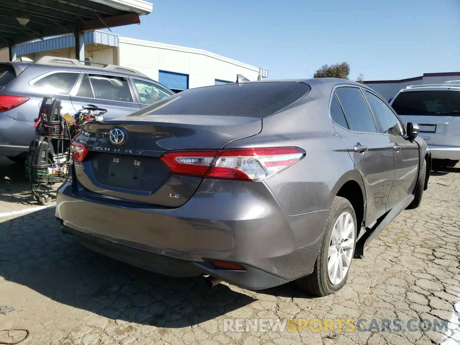 4 Photograph of a damaged car 4T1B11HK0KU742357 TOYOTA CAMRY 2019