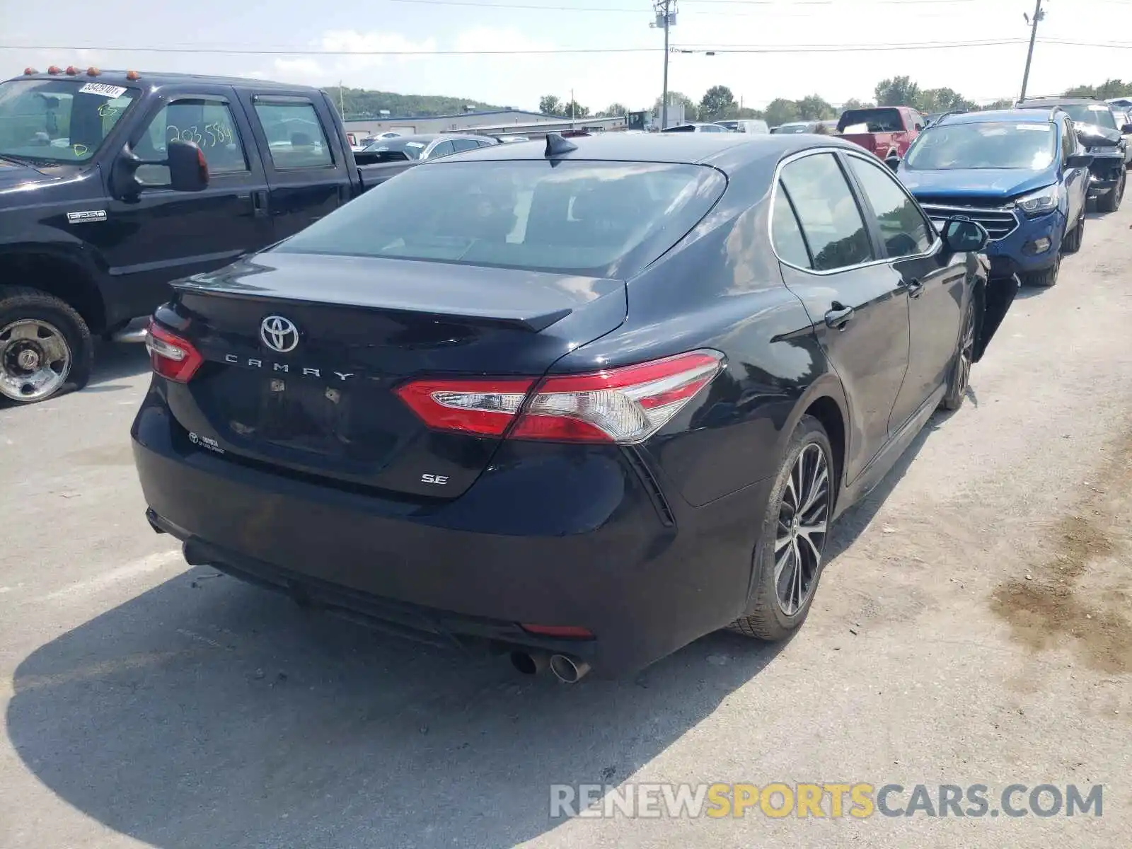 4 Photograph of a damaged car 4T1B11HK0KU743119 TOYOTA CAMRY 2019