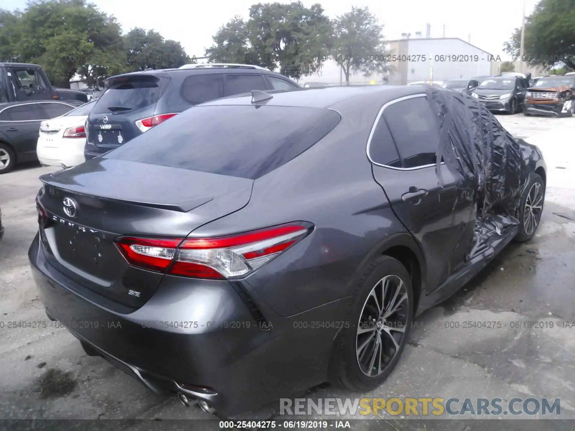 4 Photograph of a damaged car 4T1B11HK0KU743198 TOYOTA CAMRY 2019