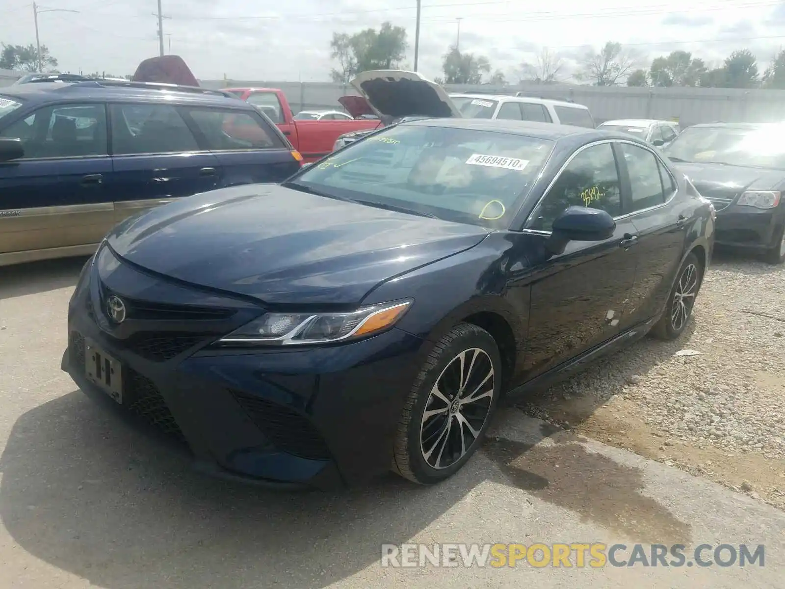 2 Photograph of a damaged car 4T1B11HK0KU743427 TOYOTA CAMRY 2019