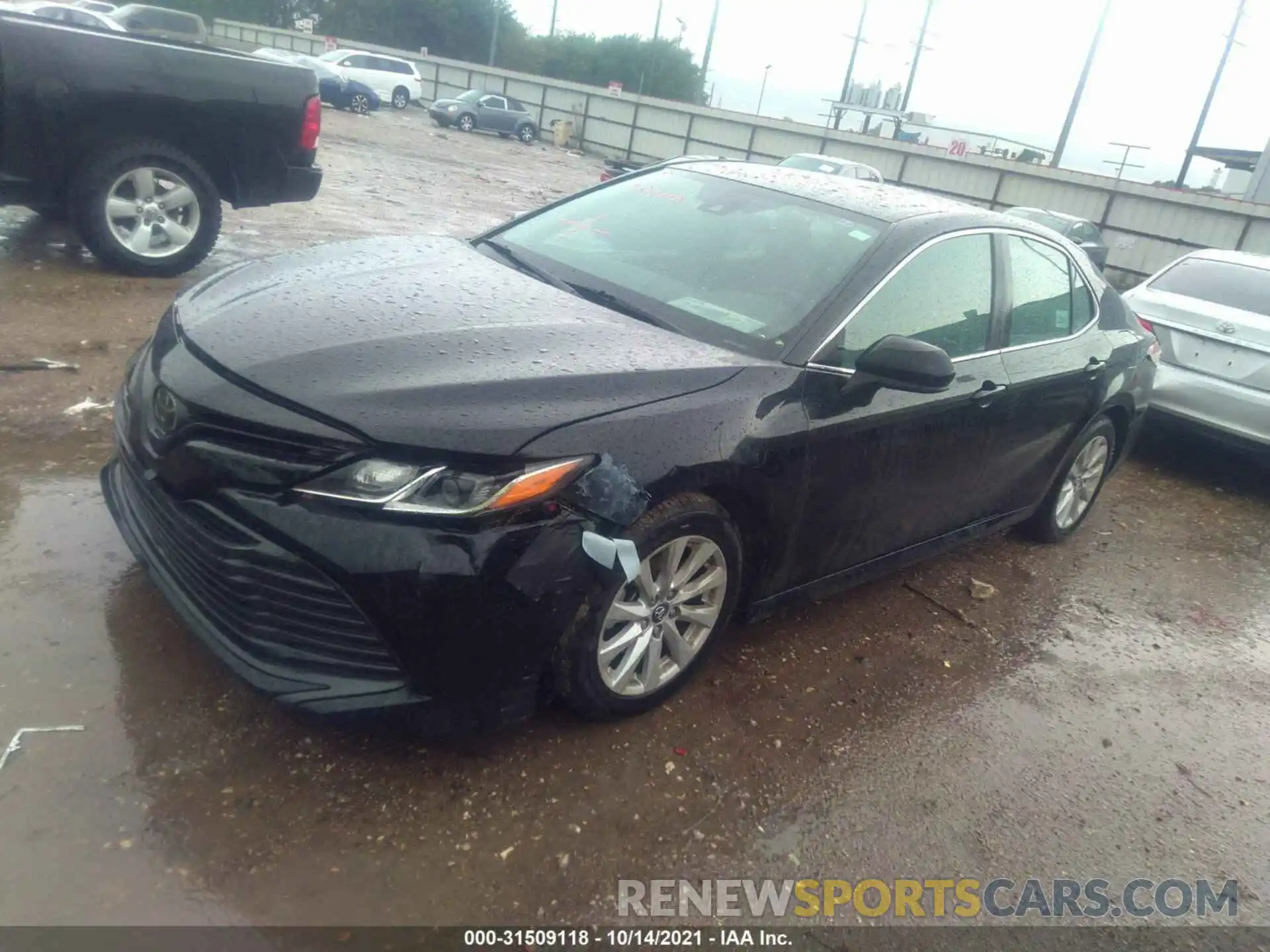 2 Photograph of a damaged car 4T1B11HK0KU744433 TOYOTA CAMRY 2019