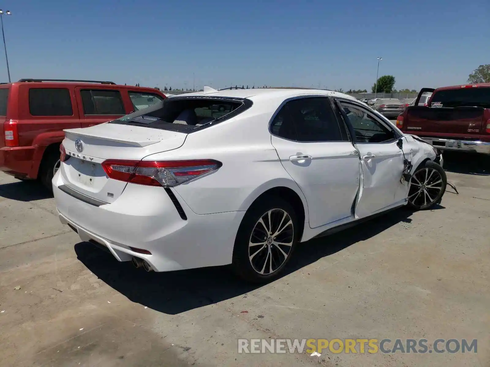 4 Photograph of a damaged car 4T1B11HK0KU744951 TOYOTA CAMRY 2019