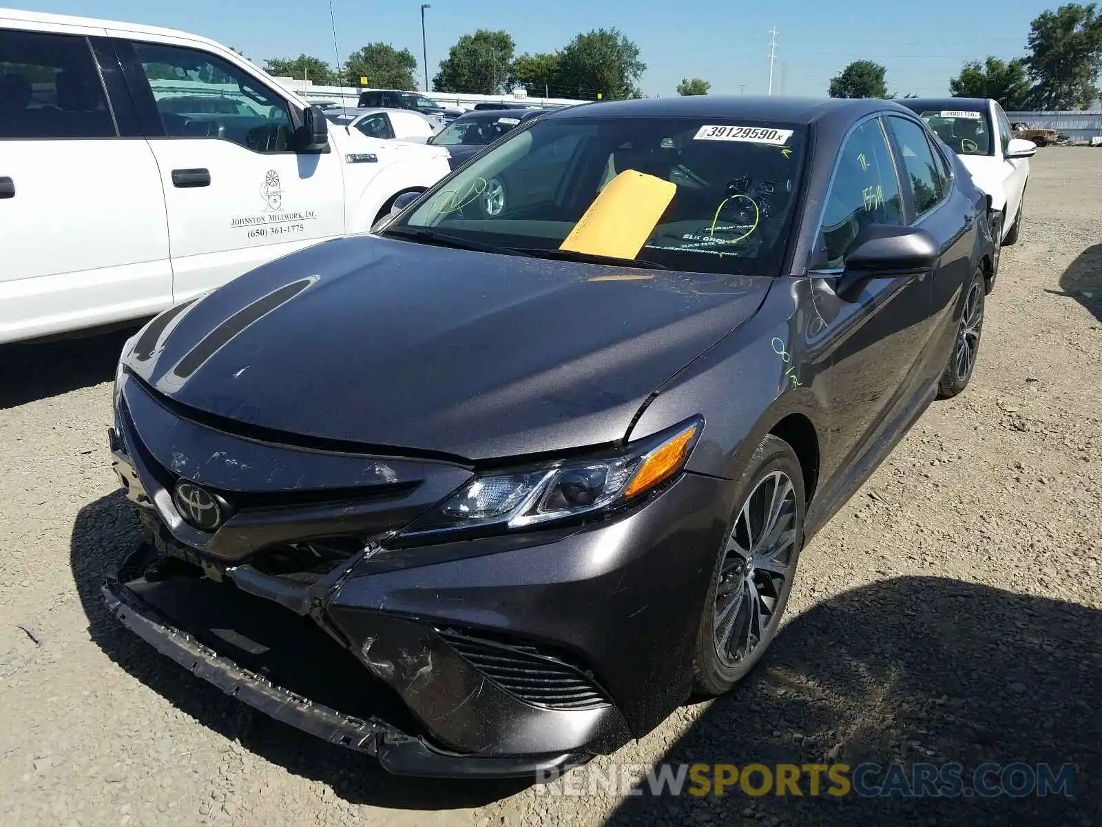 2 Photograph of a damaged car 4T1B11HK0KU745307 TOYOTA CAMRY 2019