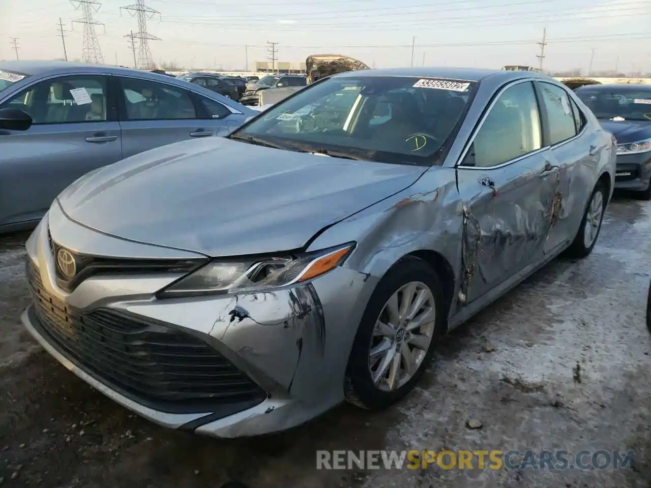 2 Photograph of a damaged car 4T1B11HK0KU745968 TOYOTA CAMRY 2019