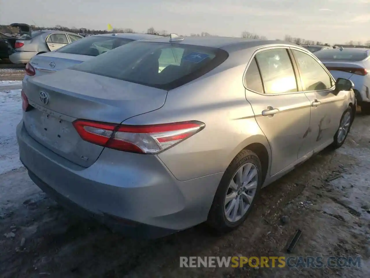 4 Photograph of a damaged car 4T1B11HK0KU745968 TOYOTA CAMRY 2019