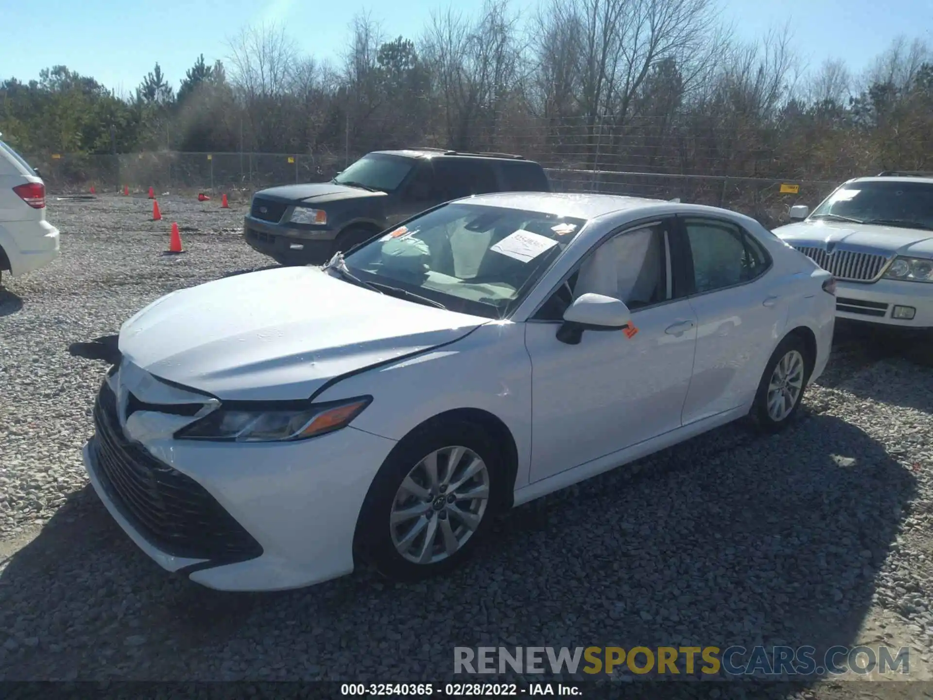 2 Photograph of a damaged car 4T1B11HK0KU747624 TOYOTA CAMRY 2019