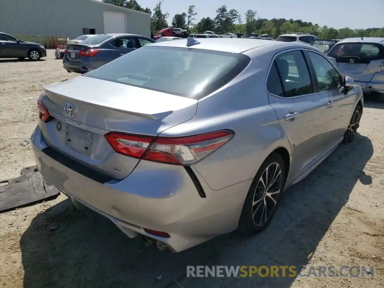 4 Photograph of a damaged car 4T1B11HK0KU747932 TOYOTA CAMRY 2019