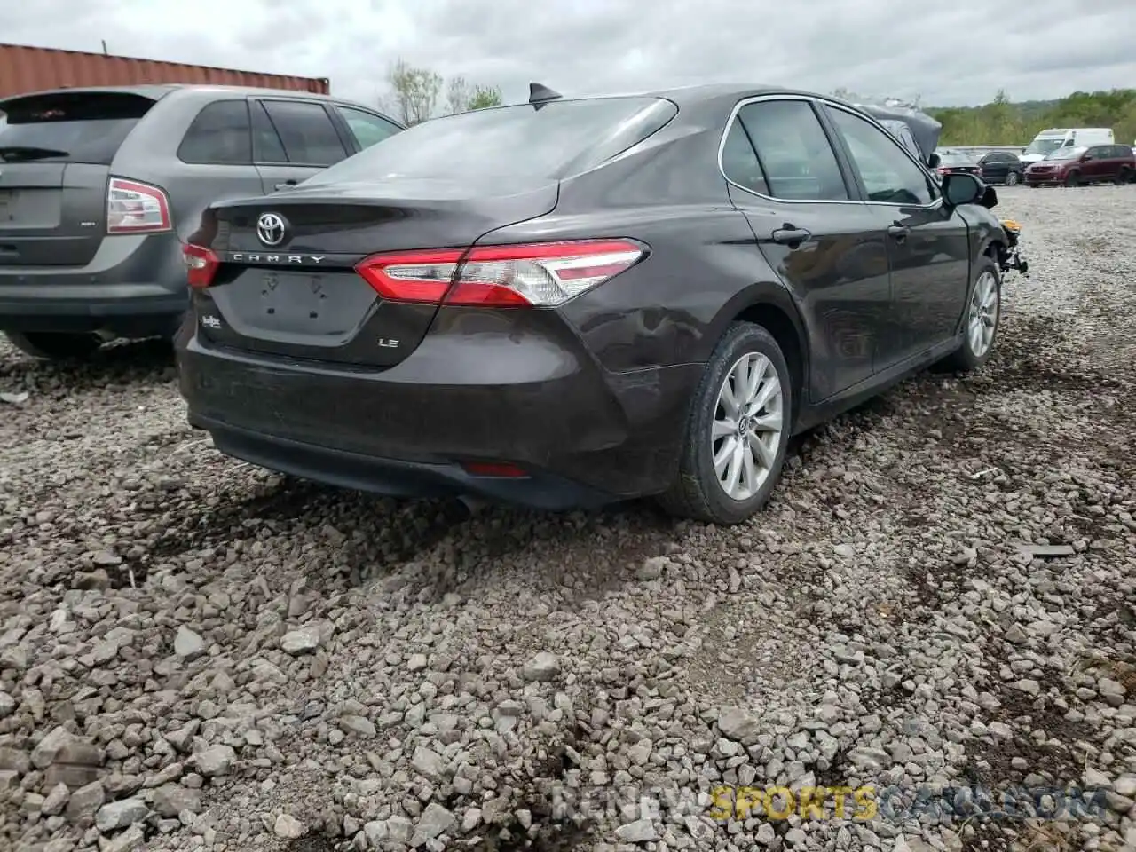 4 Photograph of a damaged car 4T1B11HK0KU748076 TOYOTA CAMRY 2019