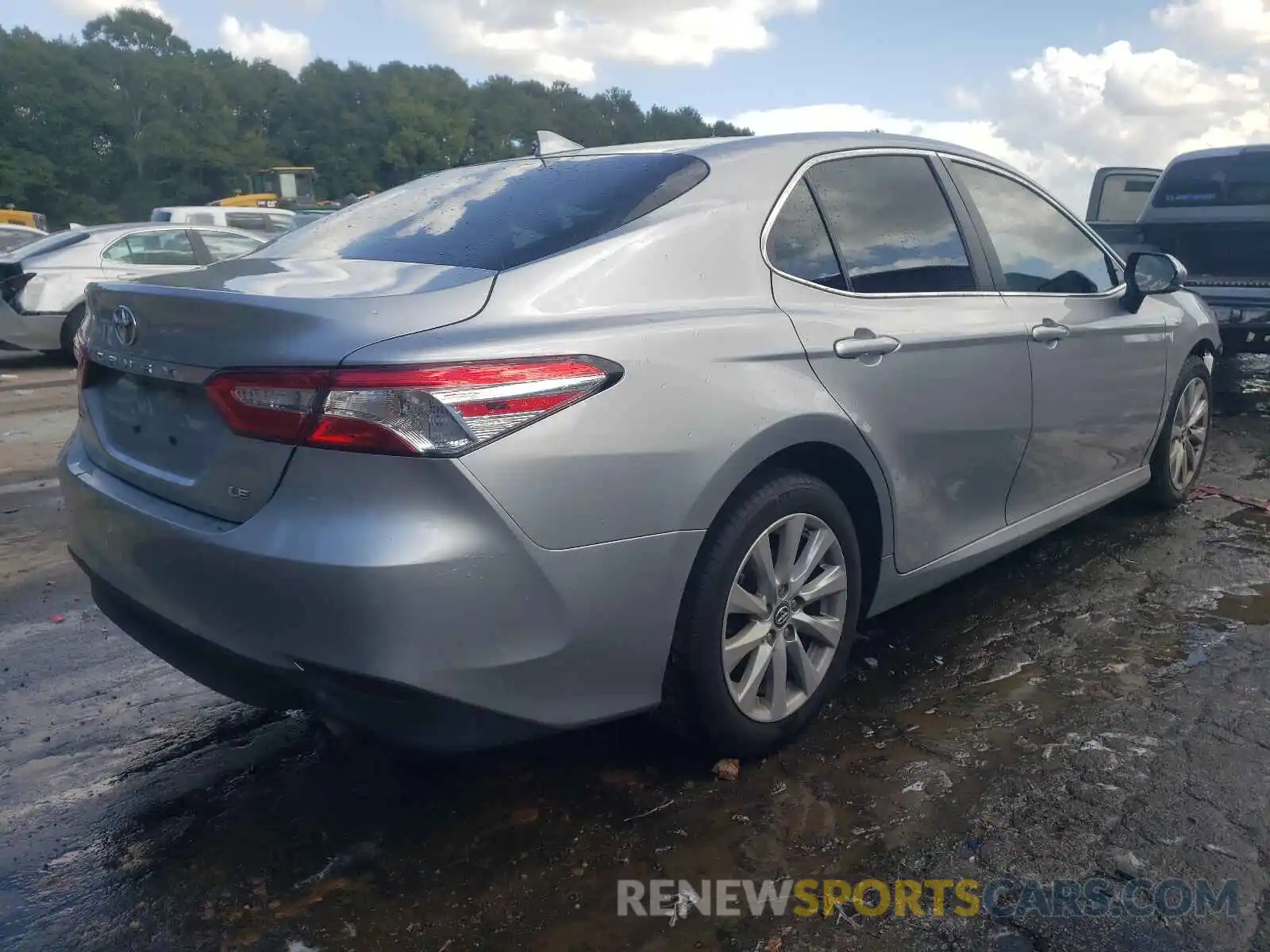 4 Photograph of a damaged car 4T1B11HK0KU751527 TOYOTA CAMRY 2019