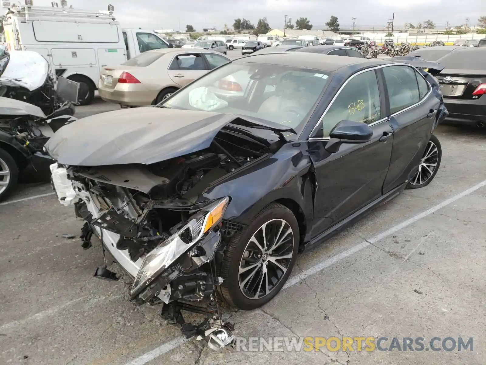 2 Photograph of a damaged car 4T1B11HK0KU752533 TOYOTA CAMRY 2019