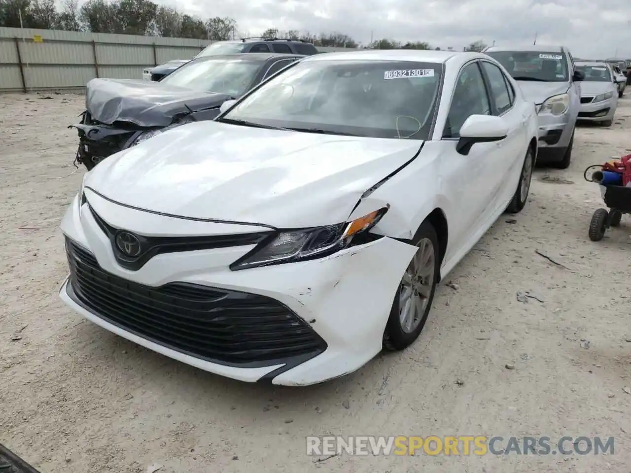 2 Photograph of a damaged car 4T1B11HK0KU753830 TOYOTA CAMRY 2019