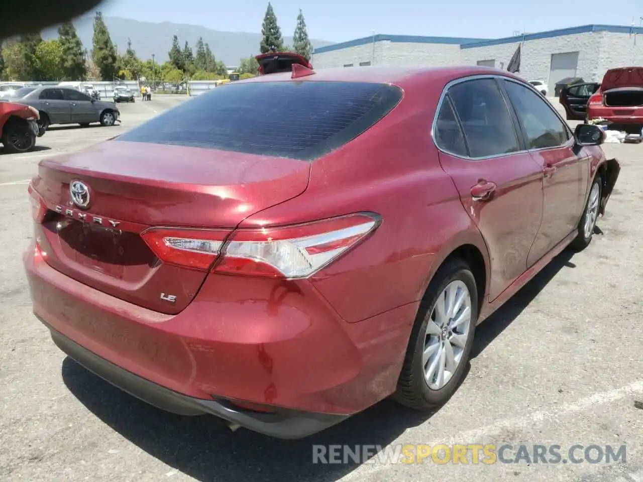 4 Photograph of a damaged car 4T1B11HK0KU754511 TOYOTA CAMRY 2019