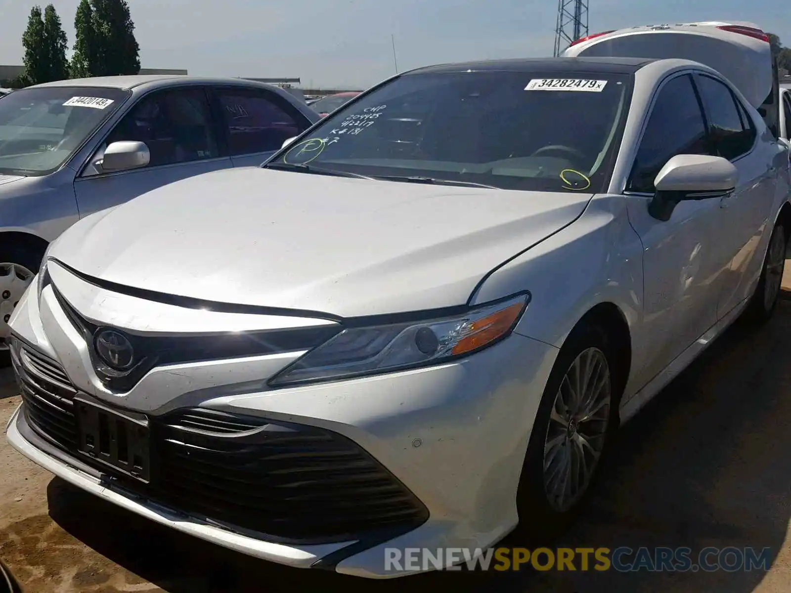 2 Photograph of a damaged car 4T1B11HK0KU756615 TOYOTA CAMRY 2019