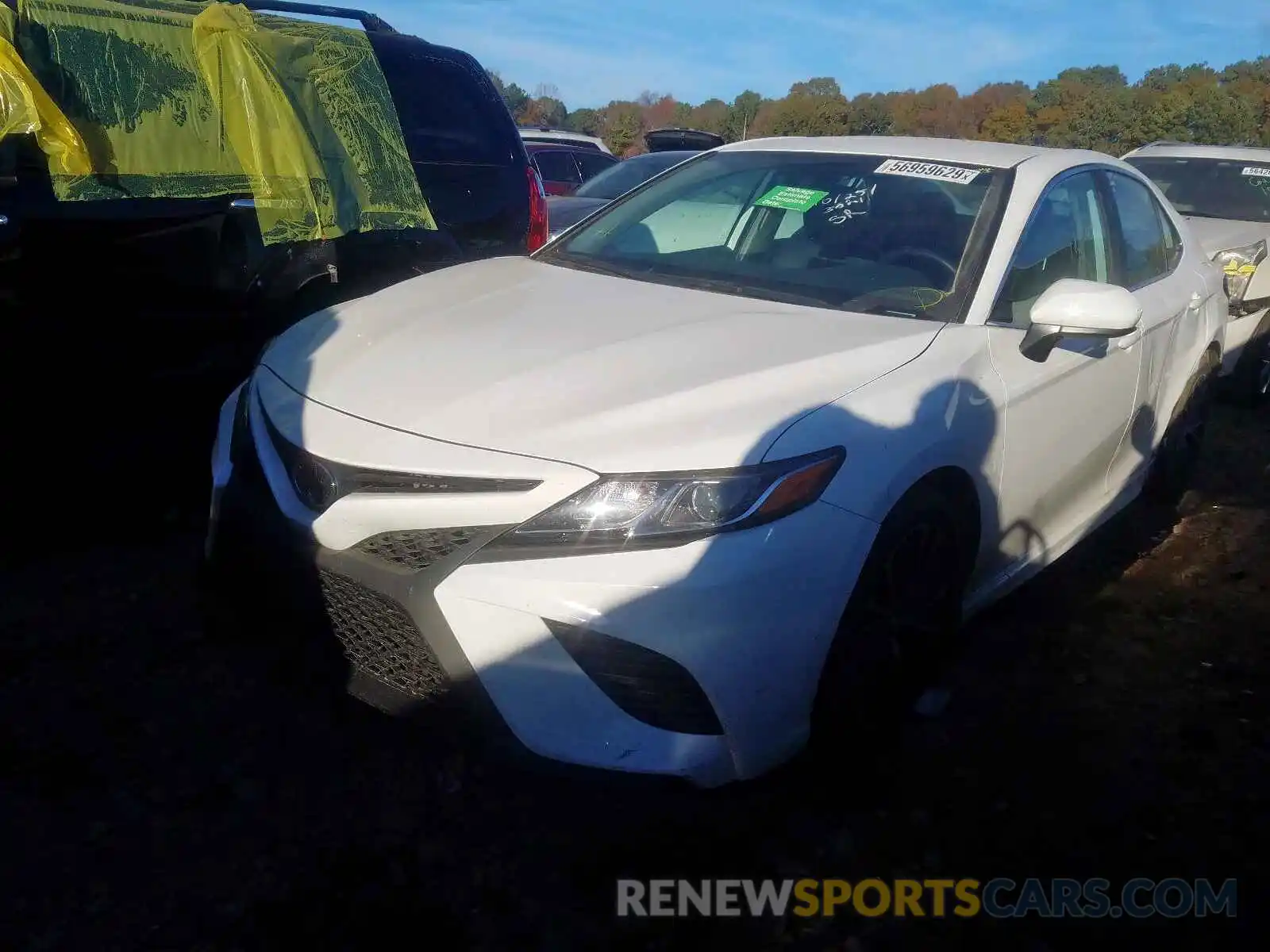 2 Photograph of a damaged car 4T1B11HK0KU757554 TOYOTA CAMRY 2019