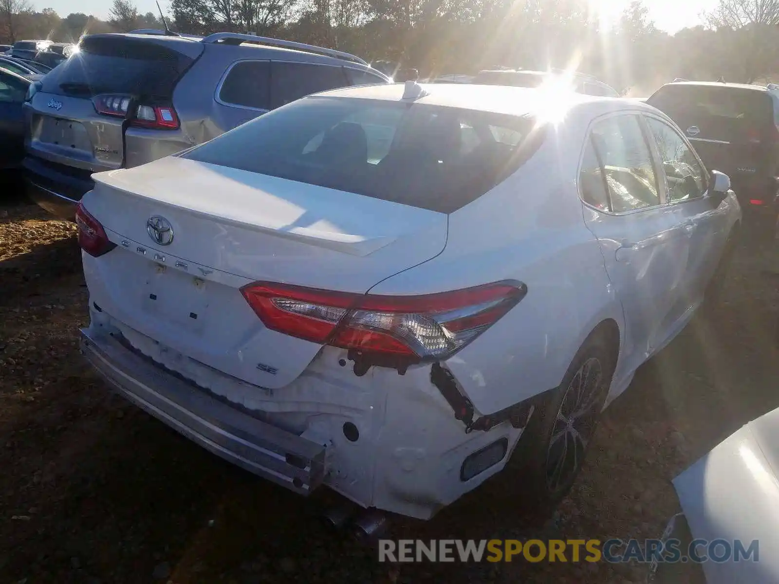 4 Photograph of a damaged car 4T1B11HK0KU757554 TOYOTA CAMRY 2019